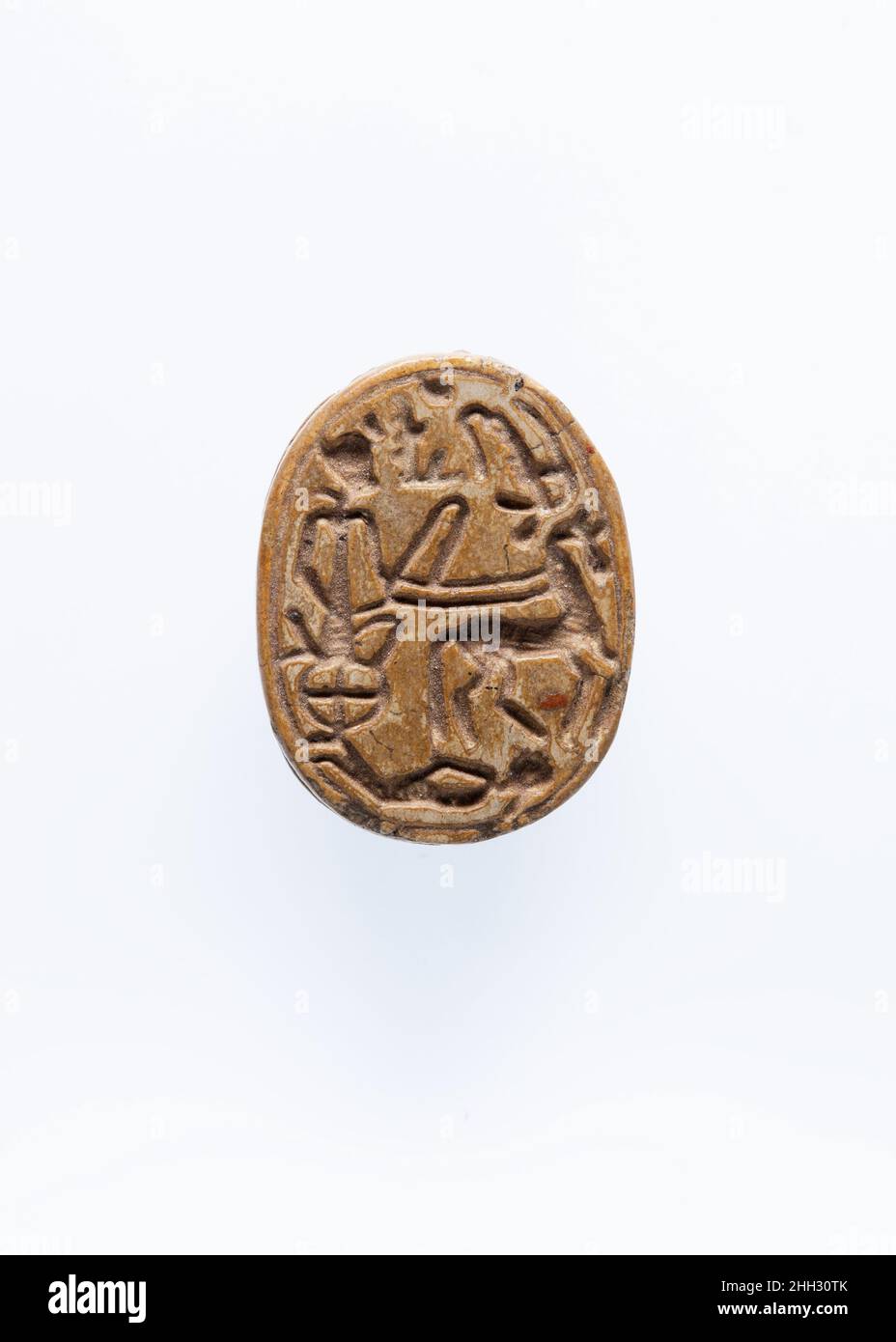 Scarab ca. 1153–1147 B.C. New Kingdom, Ramesside The scarab was shaped like a dung beetle, 'scarabaeus sacer,' which is also the source of its modern name. The dung beetle was 'kheperer' in ancient Egyptian. Having watched the small creatures push huge balls of dung, the ancient Egyptians compared the sun being pushed into the sky at dawn to the beetle, and they referred to the rising sun as 'Kheperi.' The word for 'to become' or 'come into being' was 'kheper,' and the beetle hieroglyph was used to spell all of these words. As such, the scarab became a powerful amulet for rejuvenation in this Stock Photo