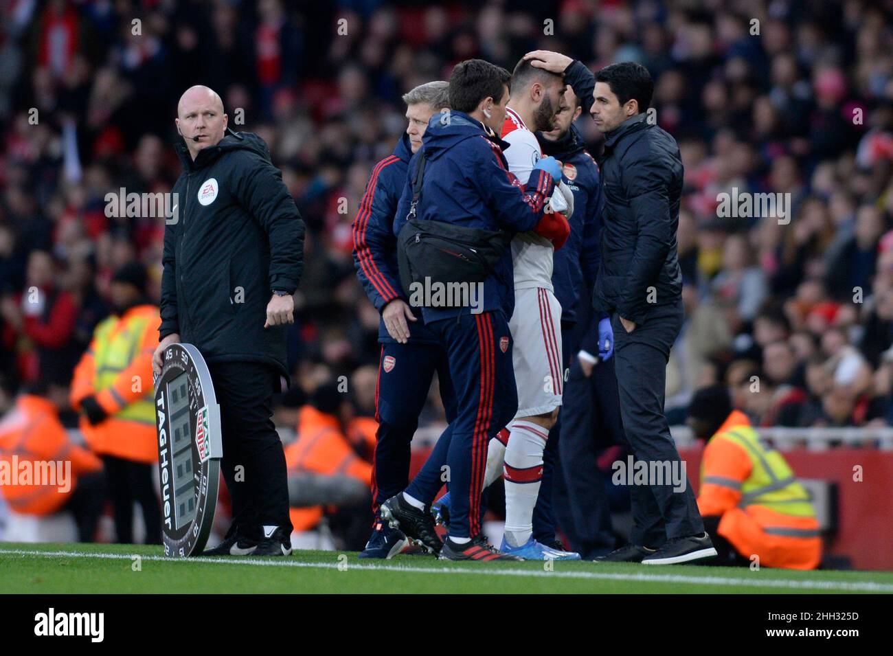 Sead Kolasinac of Arsenal leaves the pitch after suffering an injury during the Premier League match between Arsenal and Everton at the Emirates Stadium in London, UK - 16th February 2020 Stock Photo