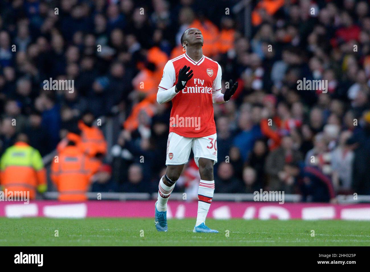 Eddie Nketiah of Arsenal celebrates scoring the equaliser during the Premier League match between Arsenal and Everton at the Emirates Stadium in London, UK - 16th February 2020 Stock Photo