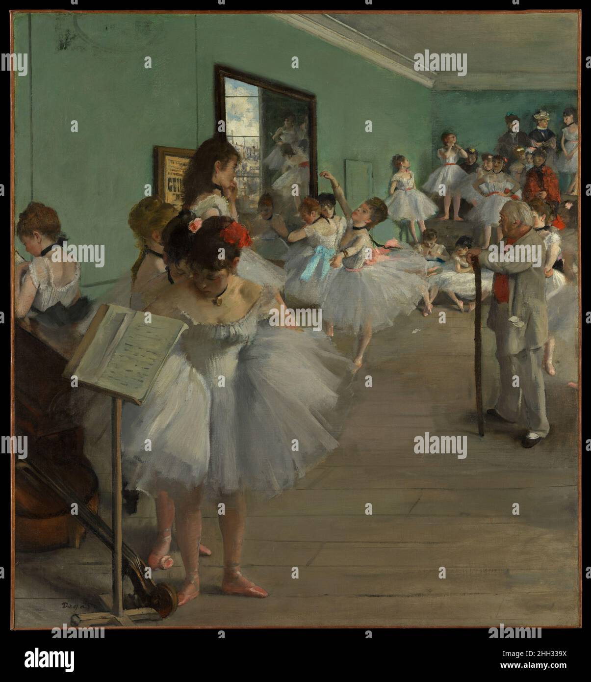 The Dance Class 1874 Edgar Degas French This work and its variant in the Musée d'Orsay, Paris, represent the most ambitious paintings Degas devoted to the theme of the dance. Some twenty-four women, ballerinas and their mothers, wait while a dancer executes an 'attitude' for her examination. Jules Perrot, a famous ballet master, conducts the class. The imaginary scene is set in a rehearsal room in the old Paris Opéra, which had recently burned to the ground. On the wall beside the mirror, a poster for Rossini’s Guillaume Tell pays tribute to the singer Jean-Baptiste Faure, who commissioned the Stock Photo