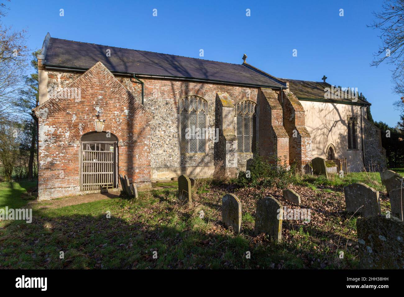Village parish church of Saint John the Baptist, Denham, Suffolk, England, UK Stock Photo