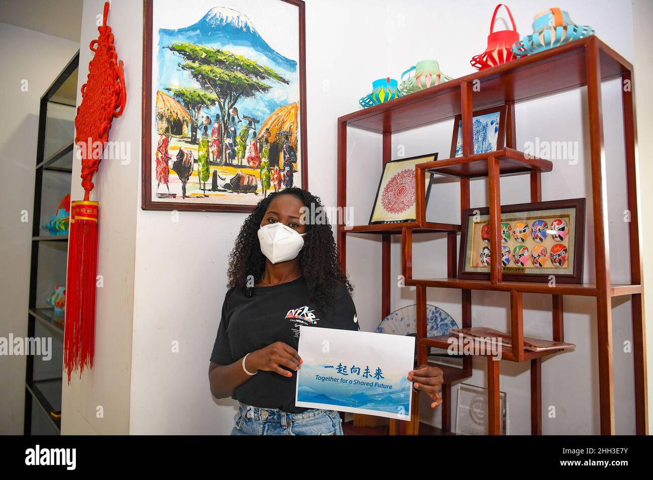 Beijing, Kenya. 17th Jan, 2022. Nancy Kiptoo from Kenya poses with a piece of paper printing