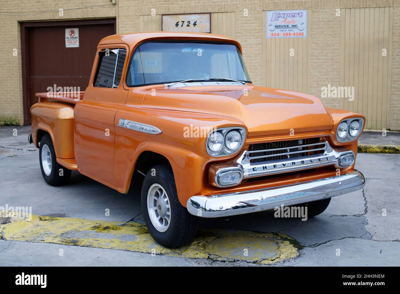 Vintage Car - Orange Chevrolet Pick-Up Stock Photo
