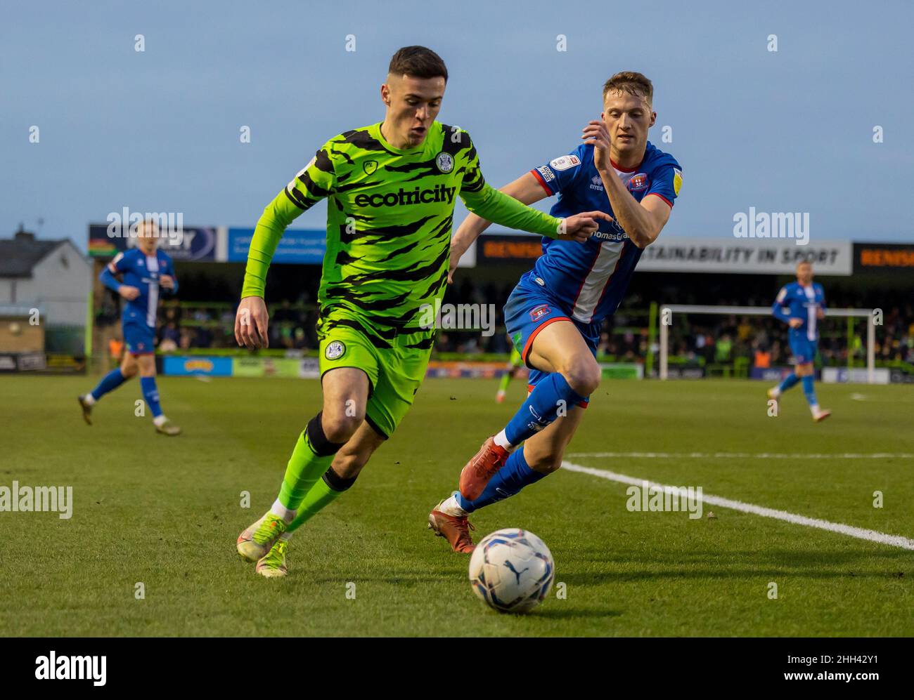 Forest Green Rovers' Jack Aitchison and Carlisle United's Jack Armer battle for the ball during the Sky Bet League Two match at The Fully Charged New Lawn, Nailsworth. Picture date: Saturday January 22, 2022. Stock Photo