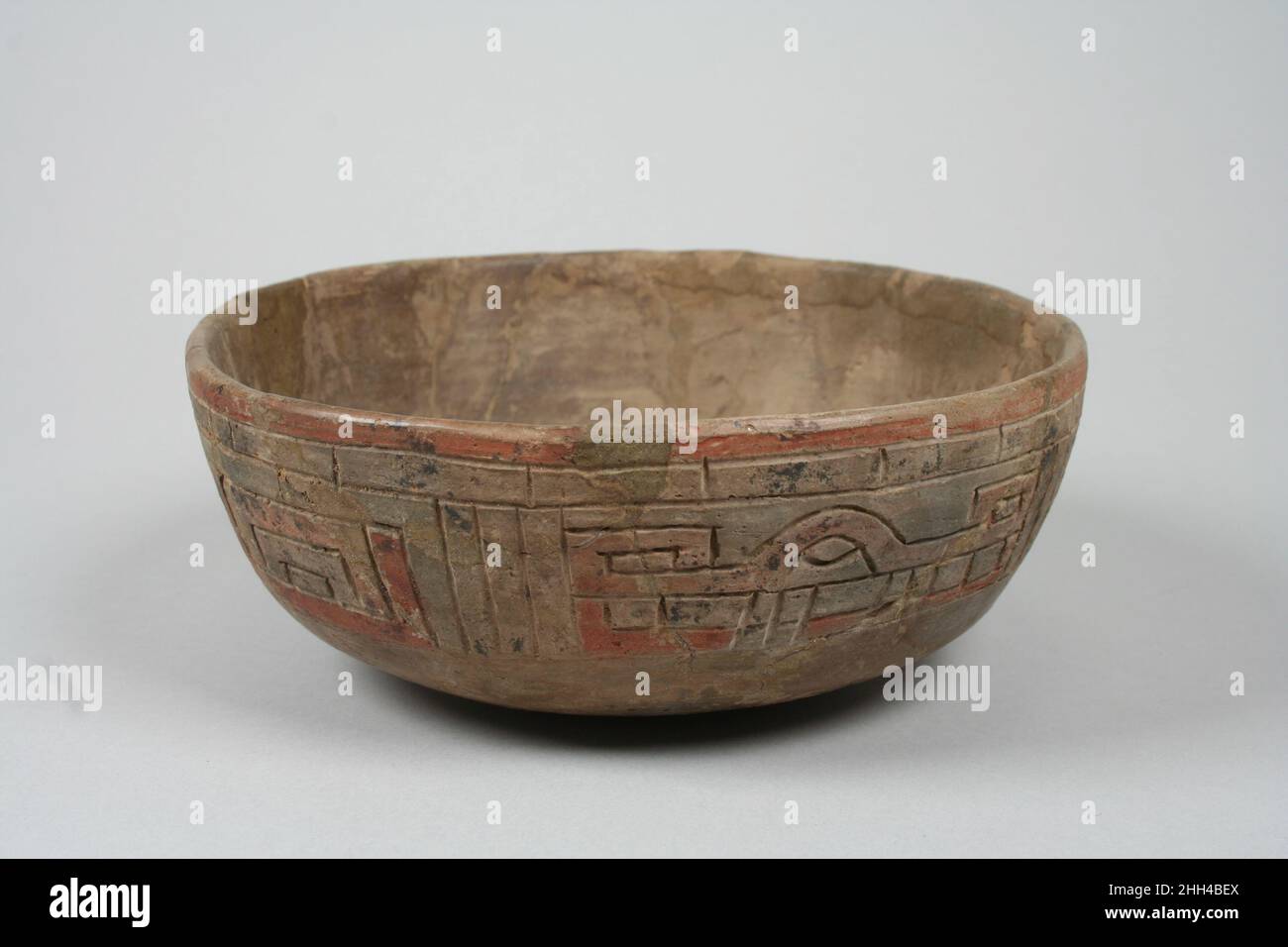 Incised bowl with fox motif 7th–5th century B.C. Paracas. Incised bowl with fox motif. Paracas. 7th–5th century B.C.. Ceramic, pigment. Peru. Ceramics-Vessels Stock Photo