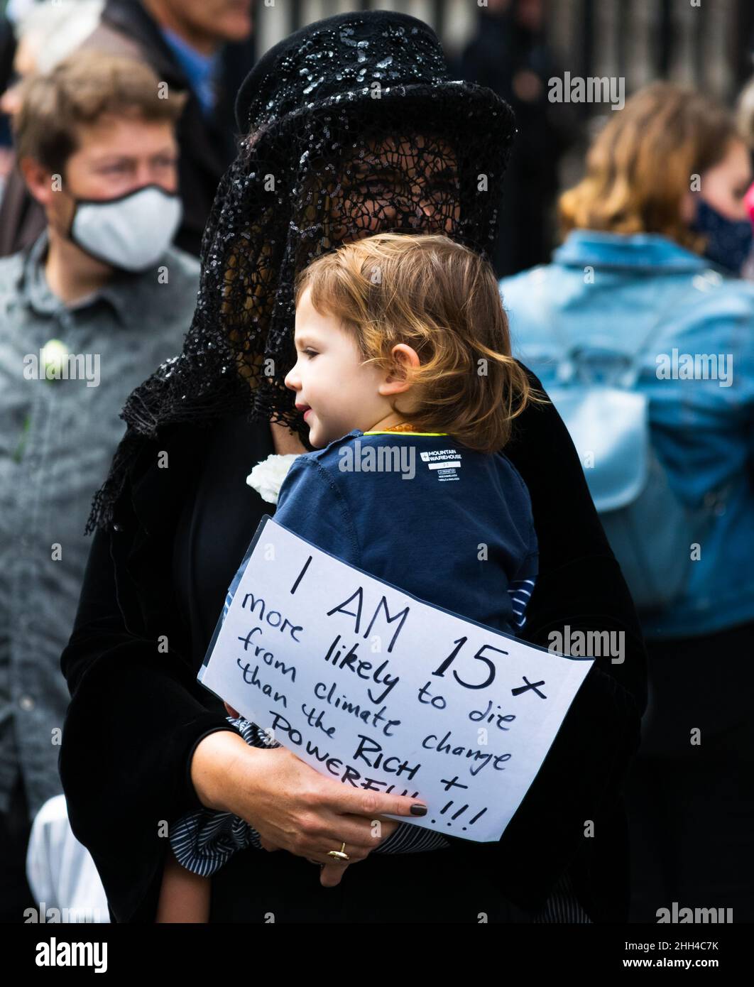Extinction Rebellion demonstration in London uses powerful white pram imagery to draw attention to the impact of climate change on young / unborn children Stock Photo