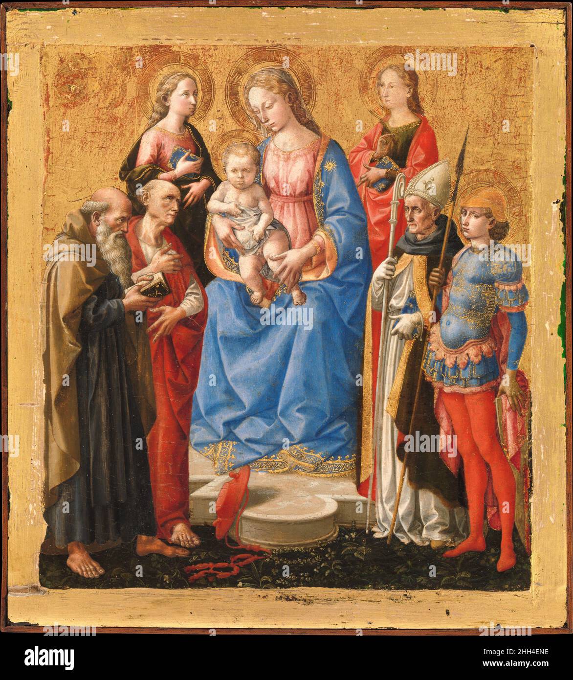 Madonna and Child with Six Saints late 1440s Pesellino (Francesco di Stefano) Italian Pesellino specialized in delicately executed small-scale paintings ideal for private study or to carry for private devotion. Remarkably, despite their small size, the figures are described with a mastery that opens a new chapter in Florentine painting. Left to right the saints are: Anthony Abbot, Jerome, Cecilia, Catherine of Alexandria, Augustine, and George. The figure types and lighting reveal the influence of Fra Filippo Lippi, with whom Pesellino occasionally collaborated.. Madonna and Child with Six Sai Stock Photo