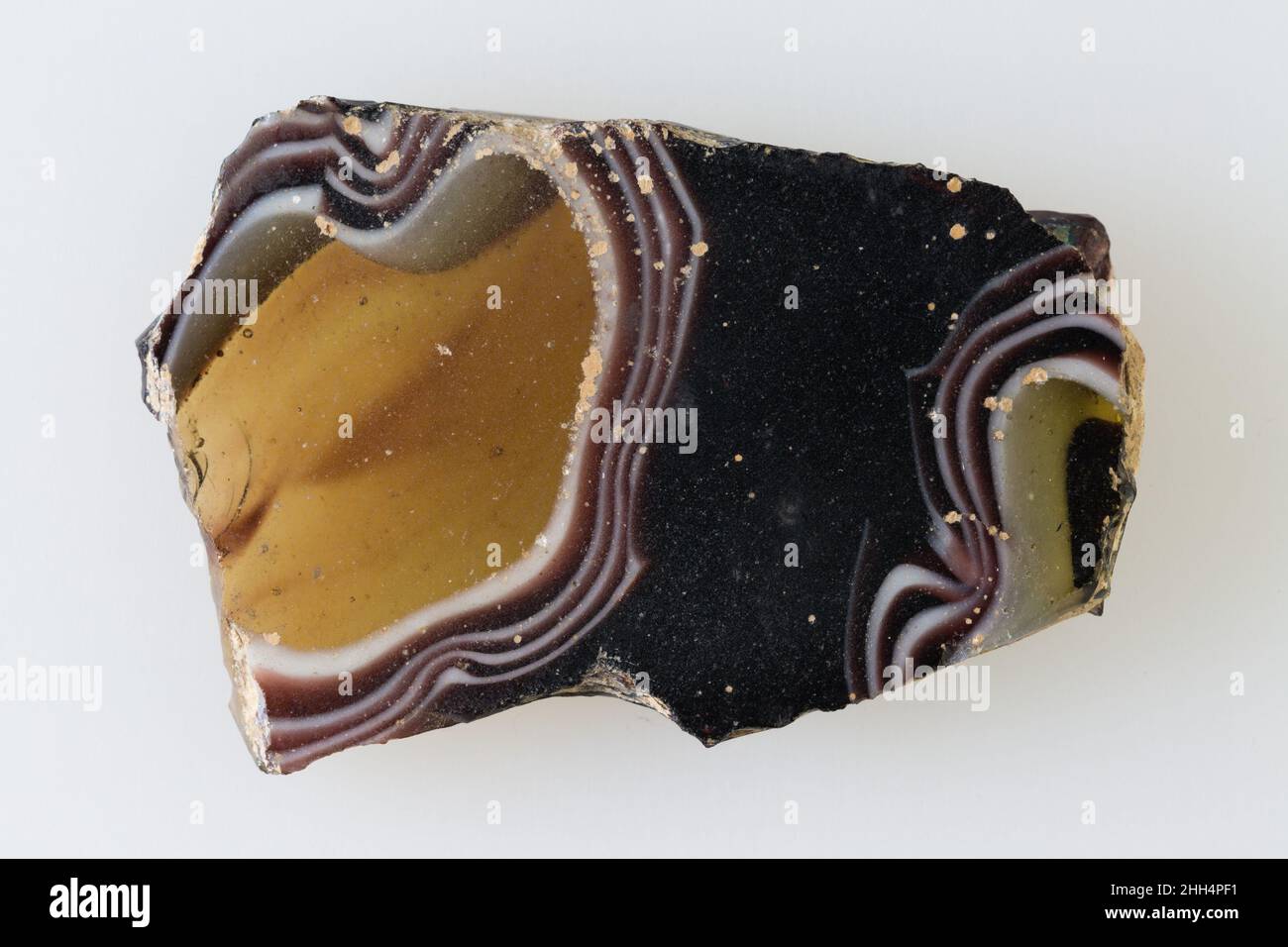 Wall revetment, agate pattern 200 BC–100 AD Ptolemaic Period–Roman Period Glass plaques imitating expensive marble or stones were used as wall coverings.. Wall revetment, agate pattern. 200 BC–100 AD. Glass. Ptolemaic Period–Roman Period. From Egypt Stock Photo