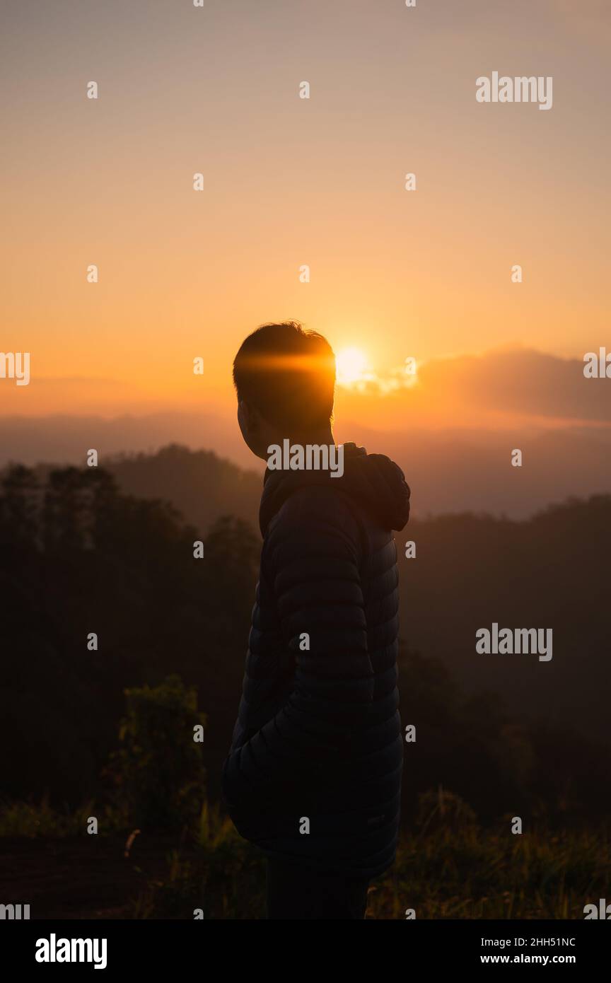 Silhouette traveler man standing hi-res stock photography and images ...