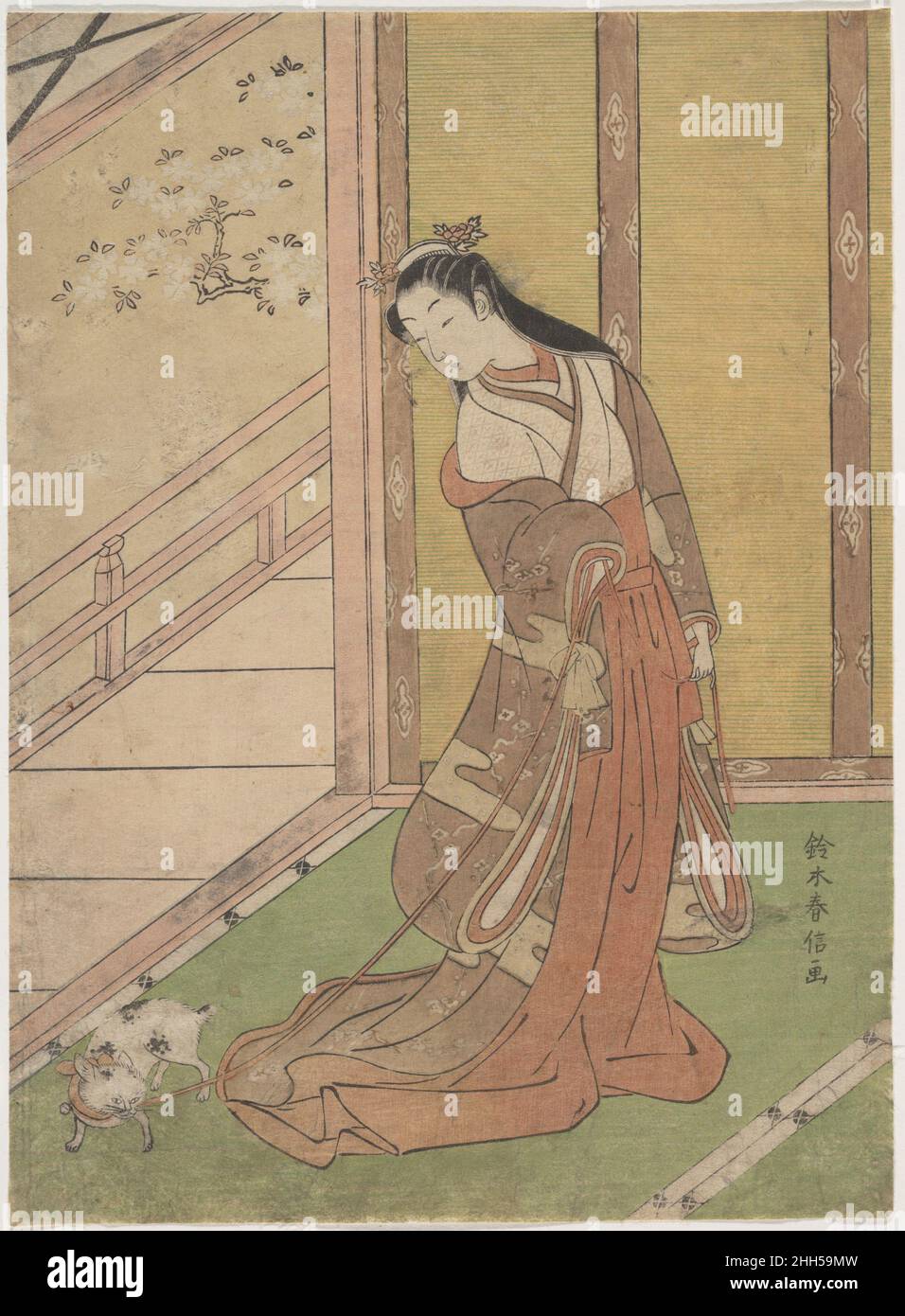 Onna San no Miya (the Third Princess) 1768–70 Suzuki Harunobu Japanese For Harunobu's sophisticated patrons, this deceptively calm scene of a palace beauty on a spring day invoked one of classic literature's most stirring tragedies. The young woman in aristocratic garb with her lively cat appears frequently in ukiyo-e and recalls a pivotal incident in the early-eleventh-century romance of Genji, the 'shining prince' who personified the Heian court's ideal of aesthetic sensitivity and discernment in the conduct of personal and public life. The doll-like figure with long flowing hair and trailin Stock Photo