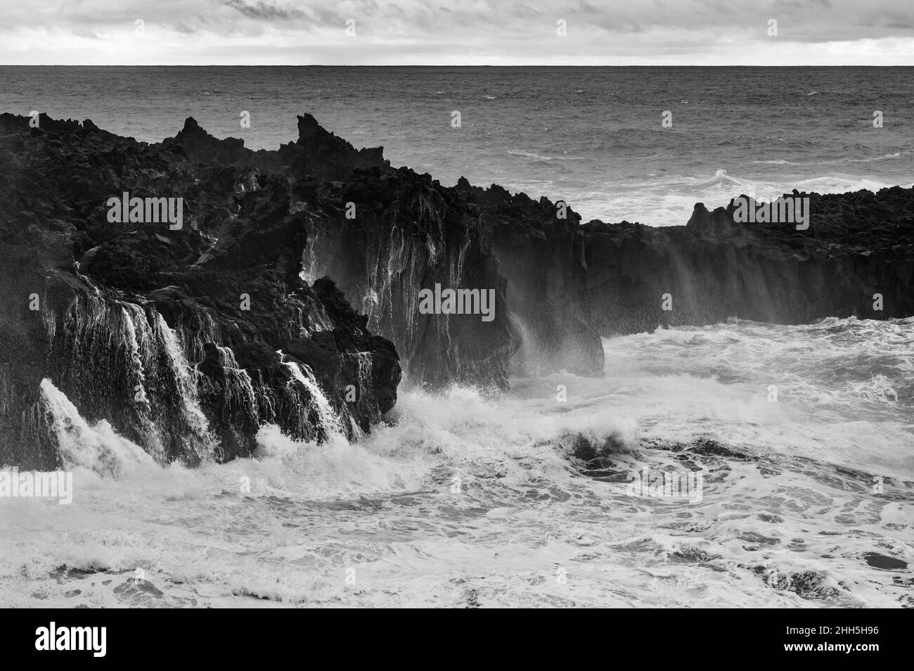 Volcanic coast with high tide waves in Ponta da Ferraria, San Miguel, Azores, Portugal Stock Photo