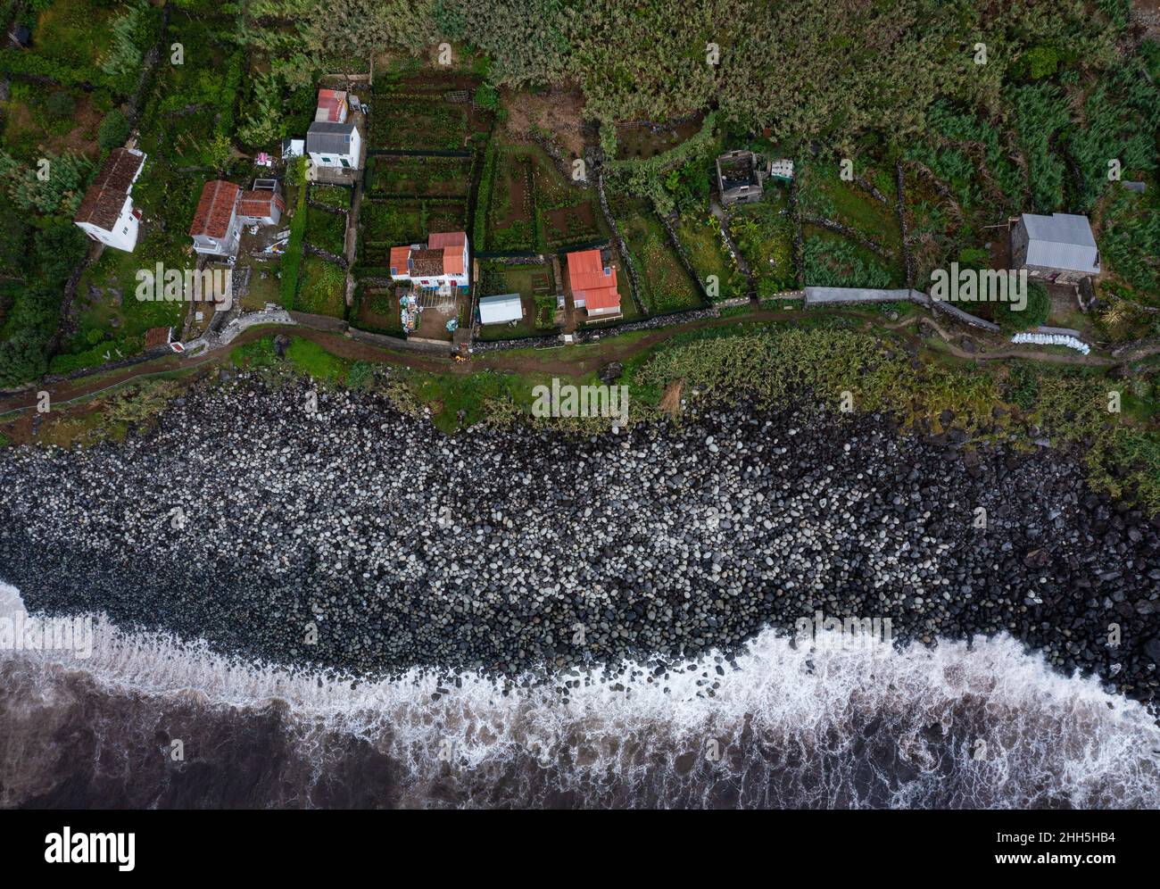 Houses at coastline of Rocha da Relva, Sao Miguel Island, Azores, Portugal Stock Photo