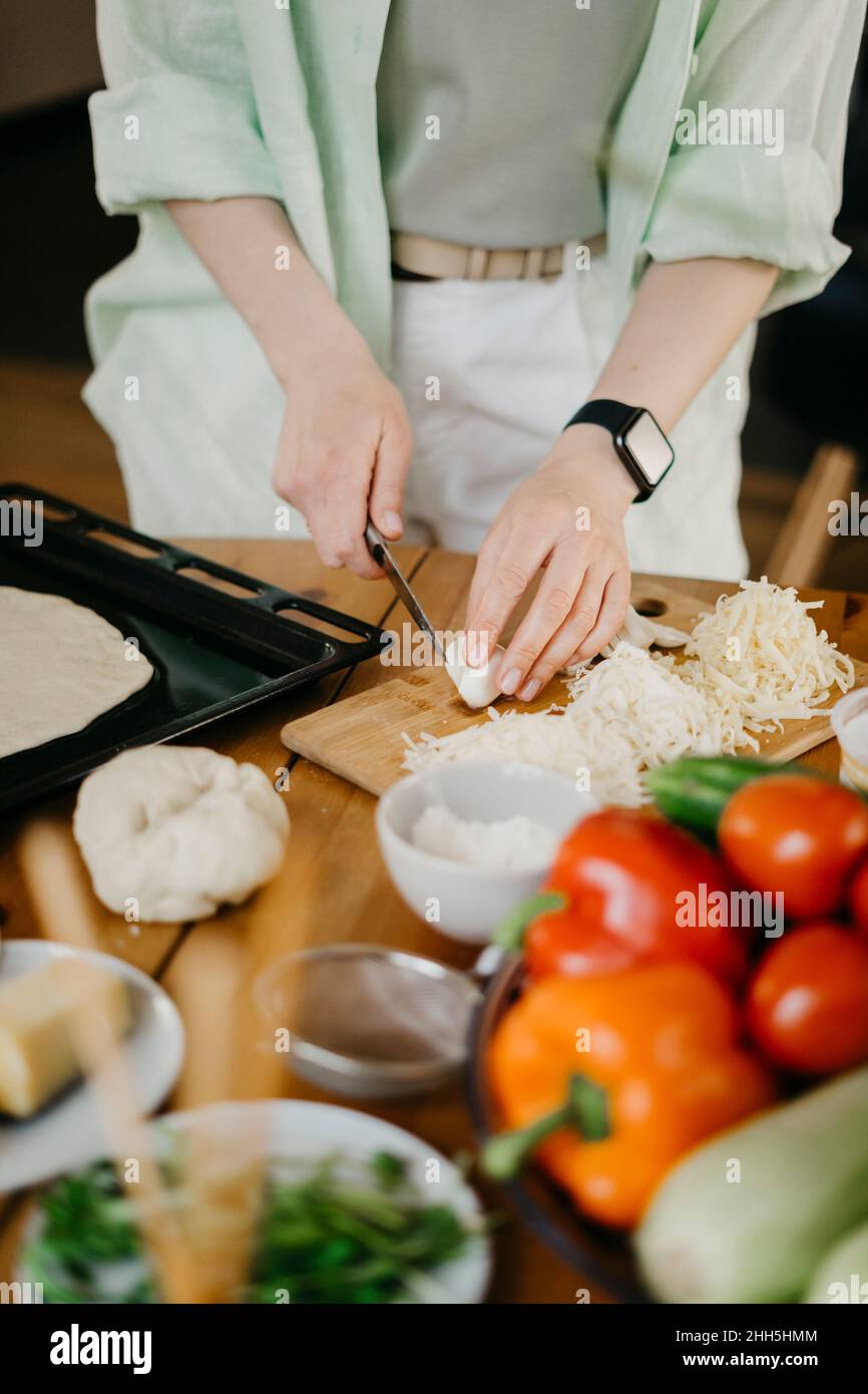 Woman chopping an onion hi-res stock photography and images - Alamy