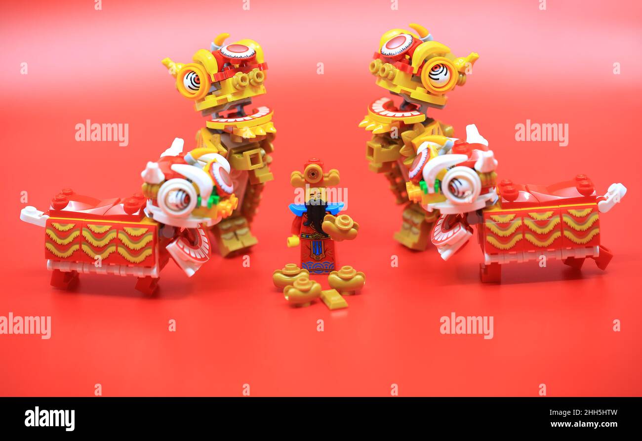 the god of wealth in china celebrate in lunar new year 2022, with the couplet writing ' receive the treasure' Stock Photo