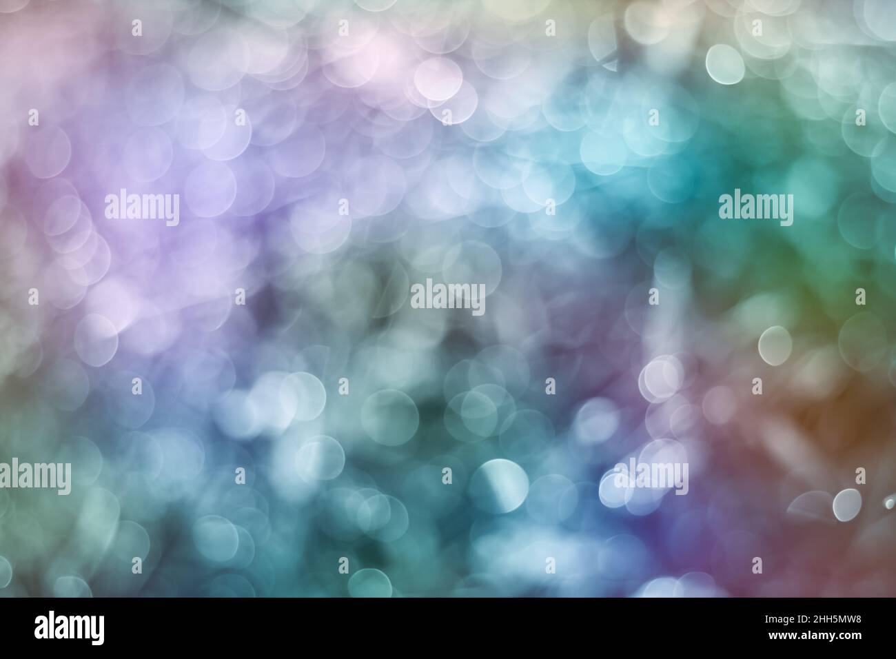 Twinkling lights blurred bokeh would make a great background. Abstract and vivid color style. Stock Photo