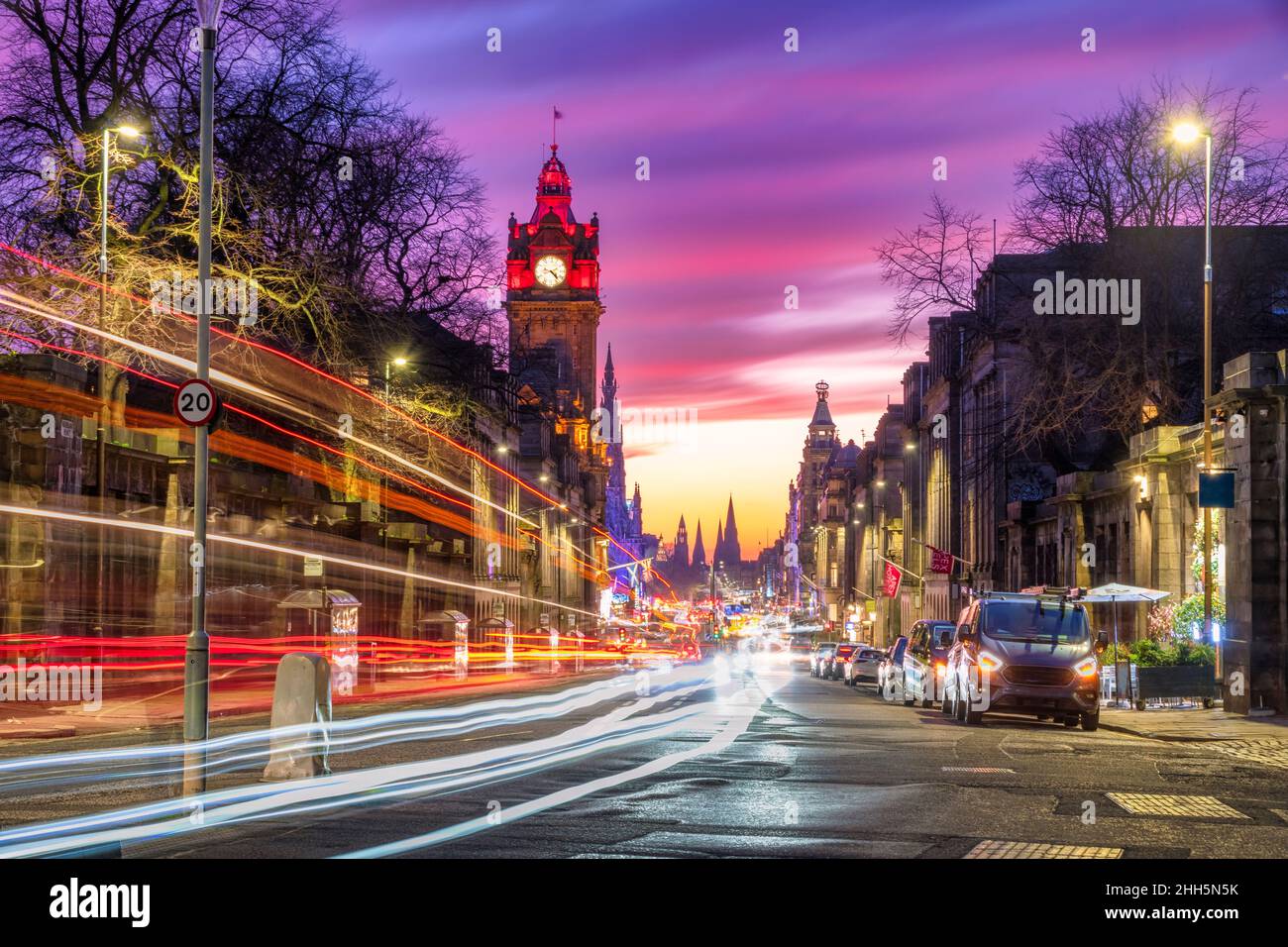 UK, Scotland, Edinburgh, Vehicle light trails along Princes Street at dusk Stock Photo