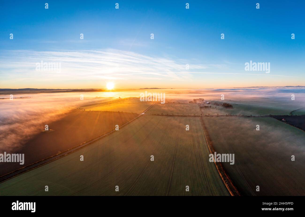 UK, Scotland, Kingston, Drone view of countryside fields at sunset Stock Photo
