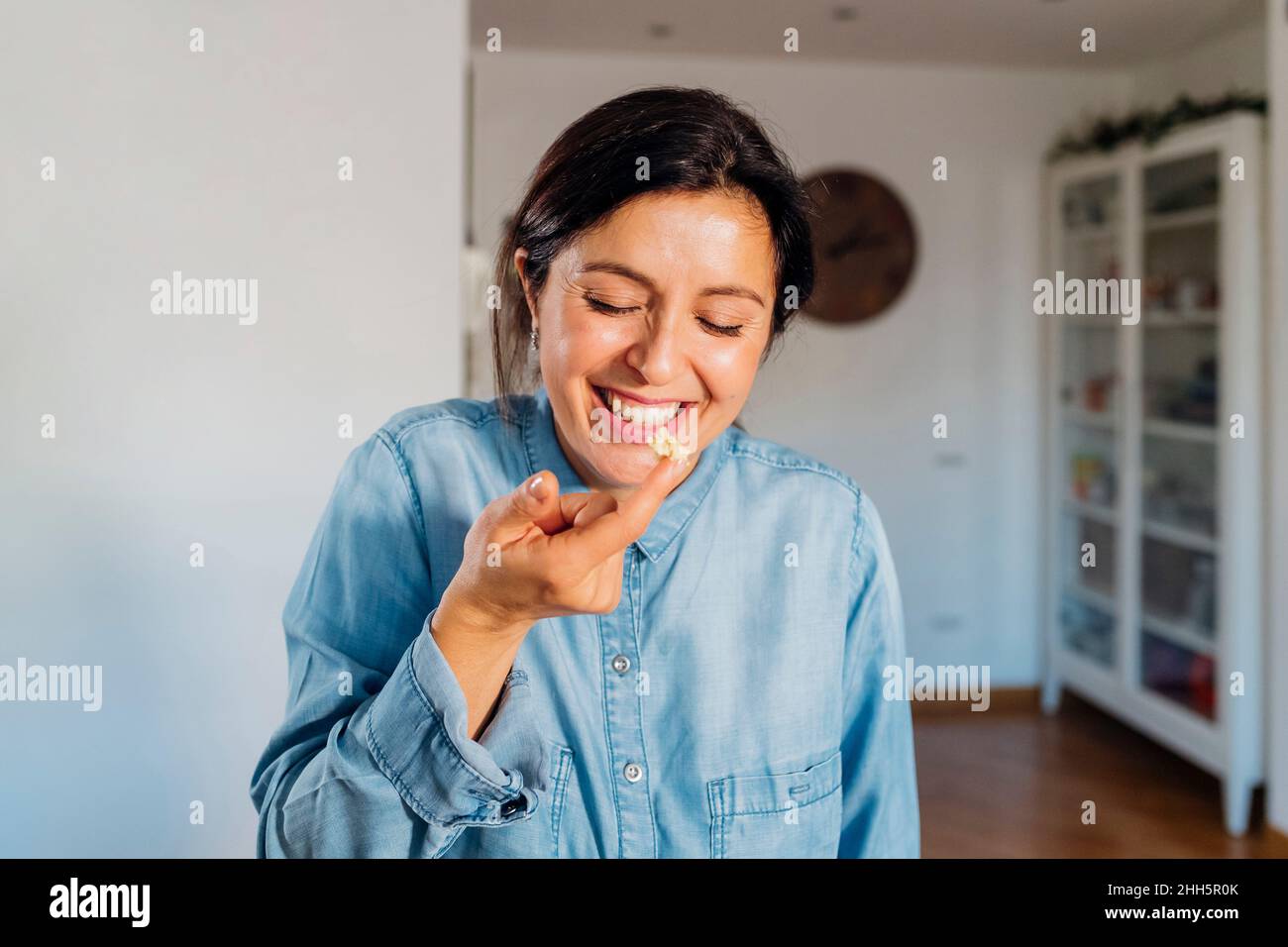 Woman index finger smile hi-res stock photography and images - Alamy