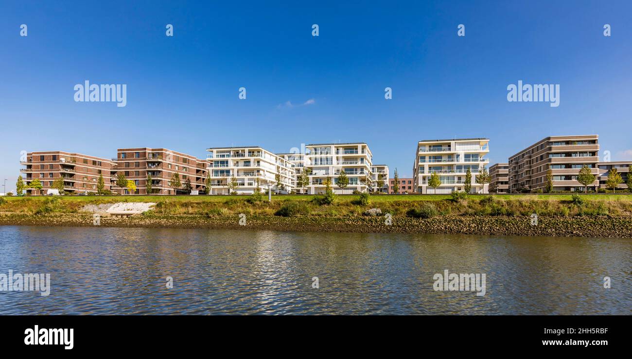 Germany, Bremen, Waterfront apartments along Weser river canal Stock