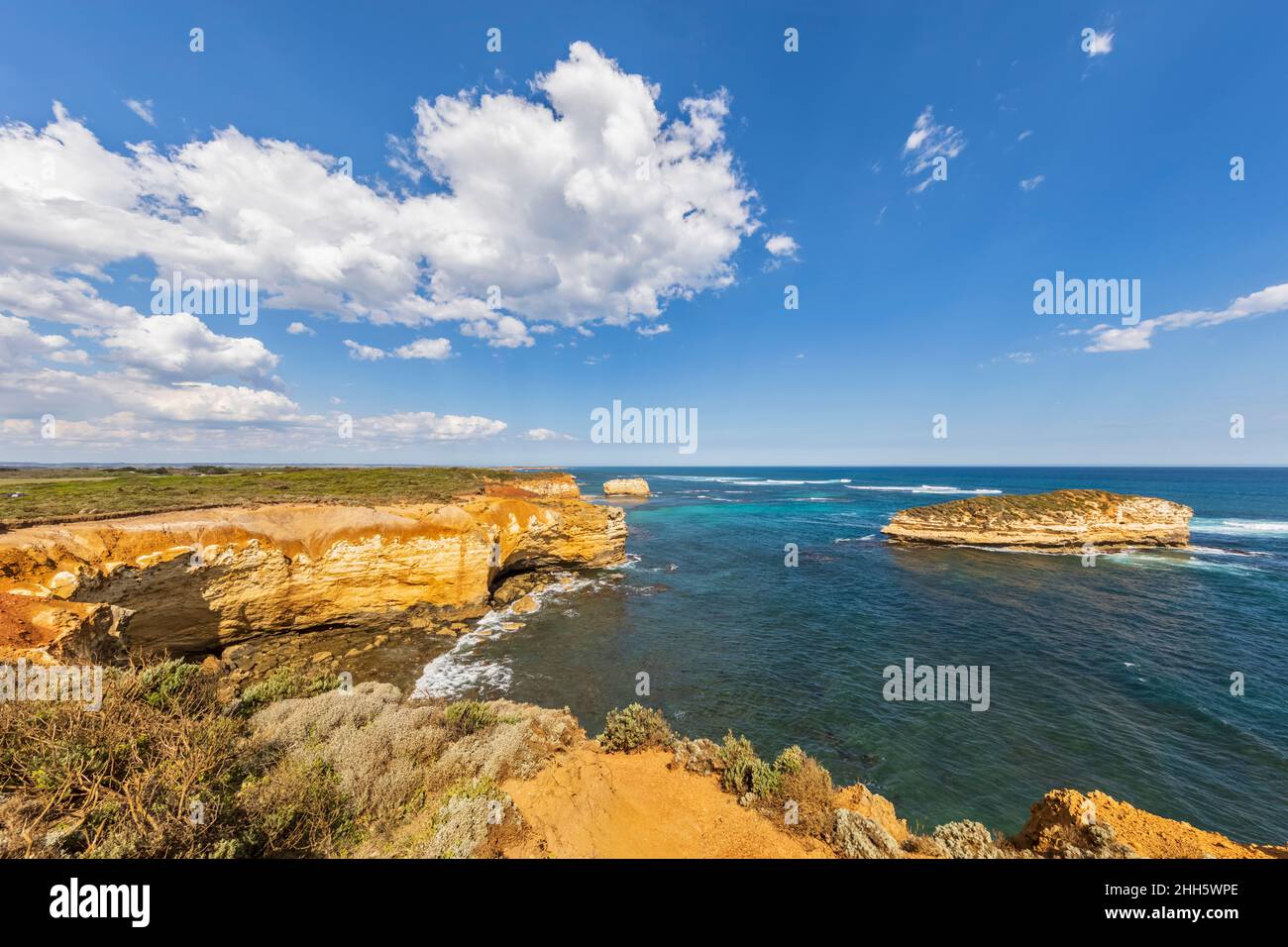 Australia, Victoria, Summer clouds over coastal landscape of Bay of Islands Stock Photo