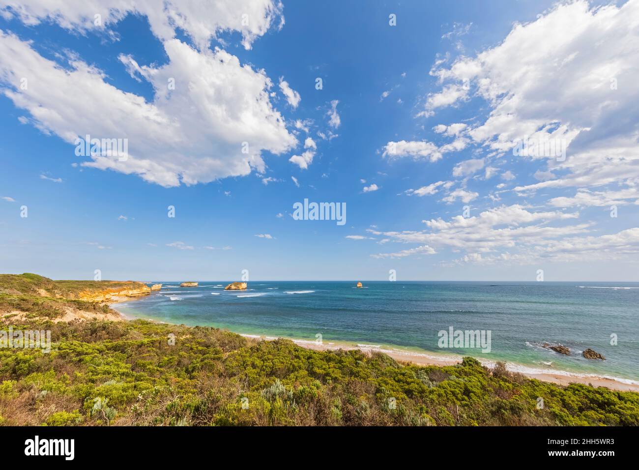 Australia, Victoria, Summer clouds over coastal landscape of Bay of Martyrs Stock Photo