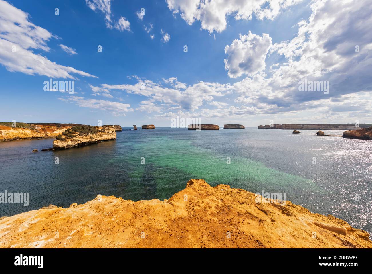 Australia, Victoria, Summer clouds over coastal landscape of Bay of Islands Stock Photo