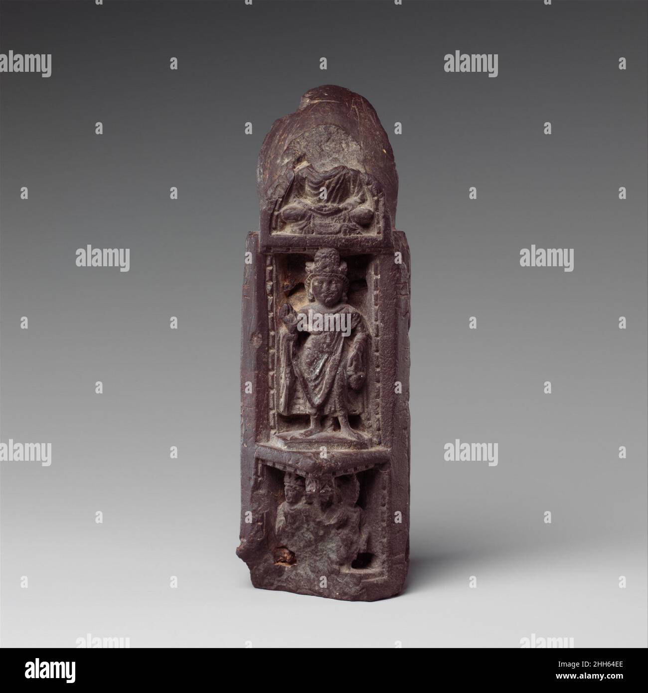 Three-Sided Section of a Portable Shrine with Scenes from the Life of the Buddha 5th–6th century Pakistan (ancient region of Gandhara) This wedge-shaped quarter section is part of a shrine that would have been circular when closed. The upper four interior registers show events from Shakyamuni's childhood and his great departure; the lowest two registers juxtapose an emaciated Buddha (representing his enlightenment) with his first sermon.. Three-Sided Section of a Portable Shrine with Scenes from the Life of the Buddha  38224 Stock Photo