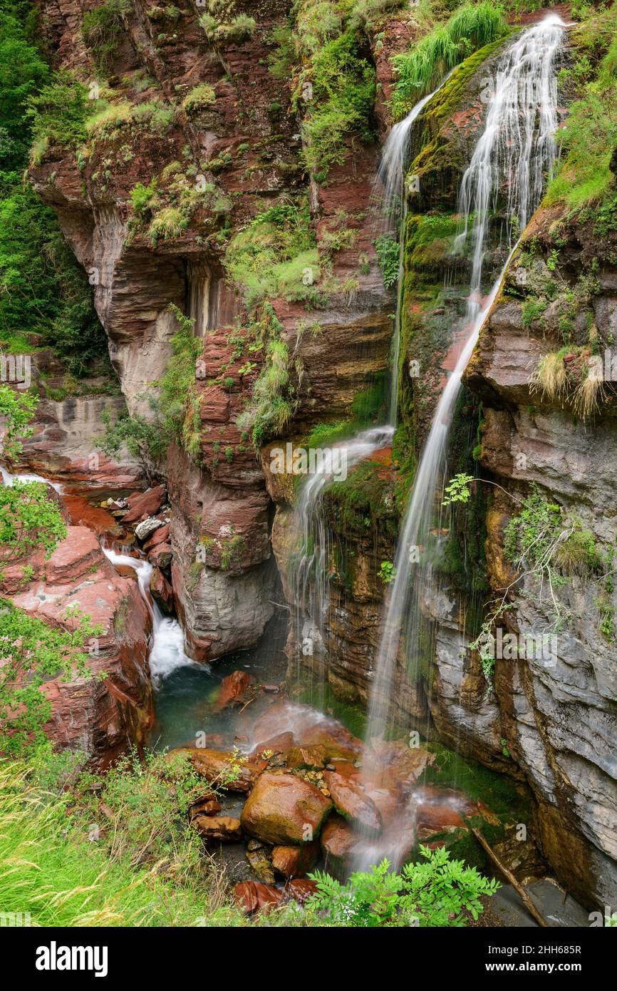 Waterfall flowing over mountains at Maritime Alps, Mercantour National Park, France Stock Photo