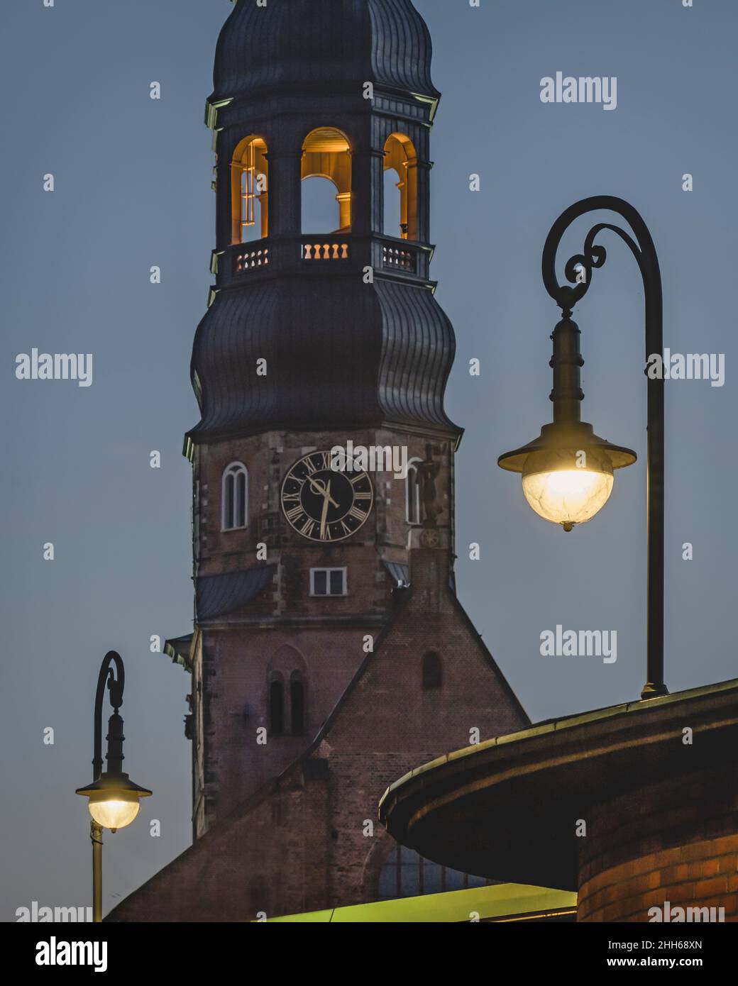 Germany, Hamburg, Bell tower of Saint Catherines Church at dusk Stock Photo