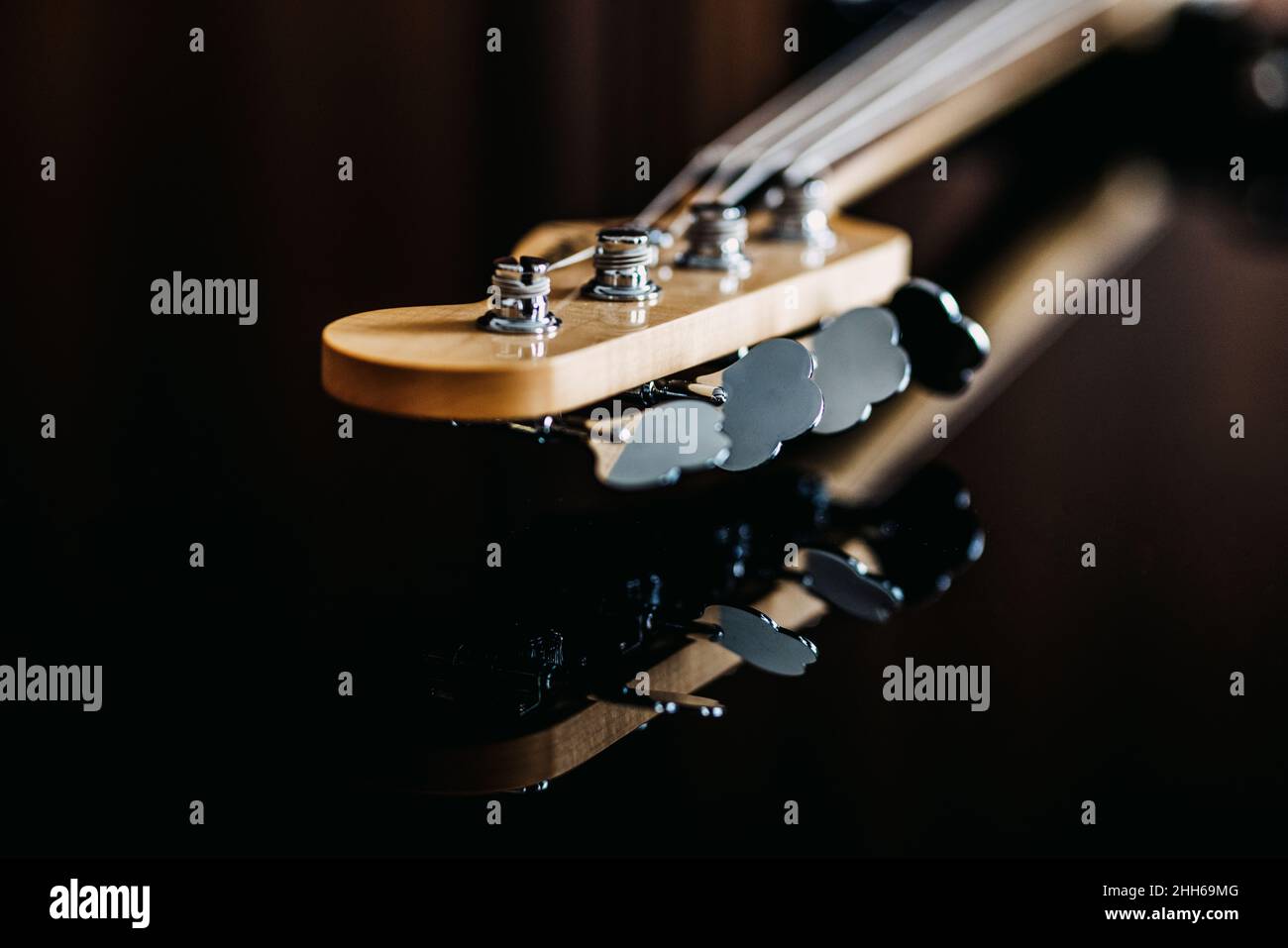 Studio shot of guitar headstock and tuning pegs Stock Photo