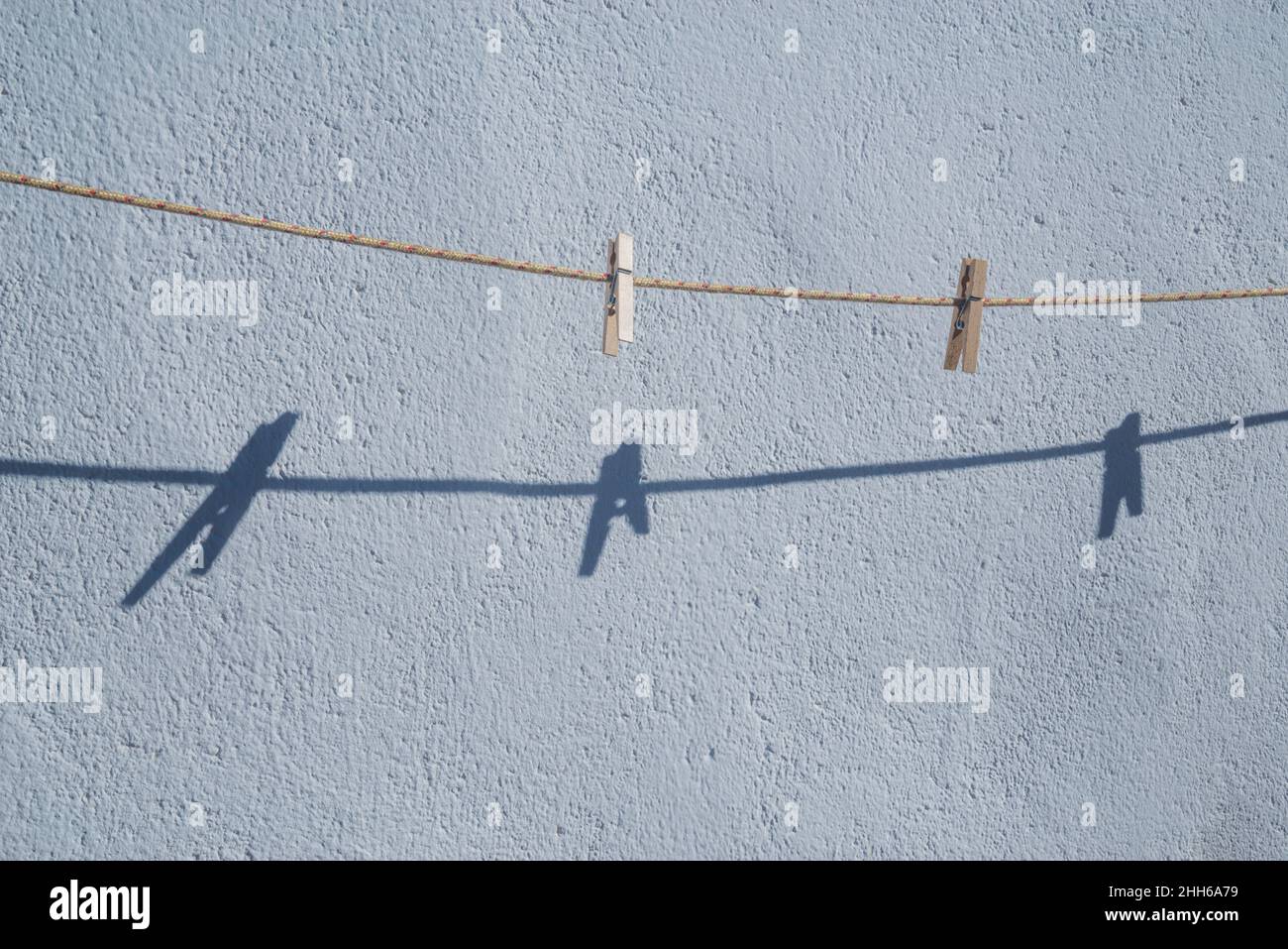 Clothespins on the rope Stock Photo