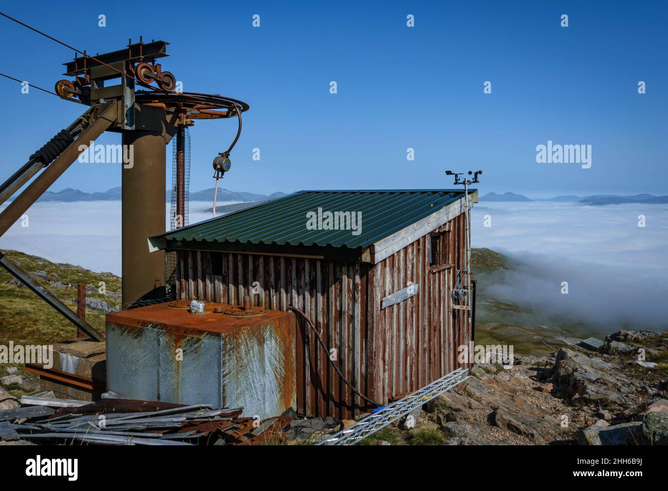 Cloud inversion at Glencoe Chairlift. Bright sunny day above the sea of