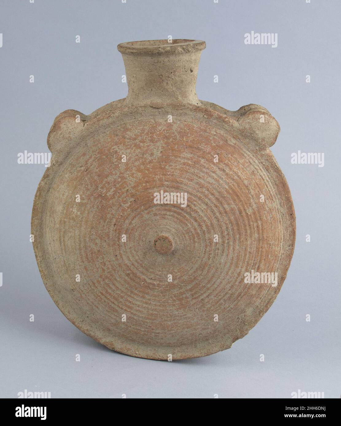 Pilgrim flask Cypriot Angular body and short wide neck.. Pilgrim flask. Cypriot. Terracotta. Vases Stock Photo