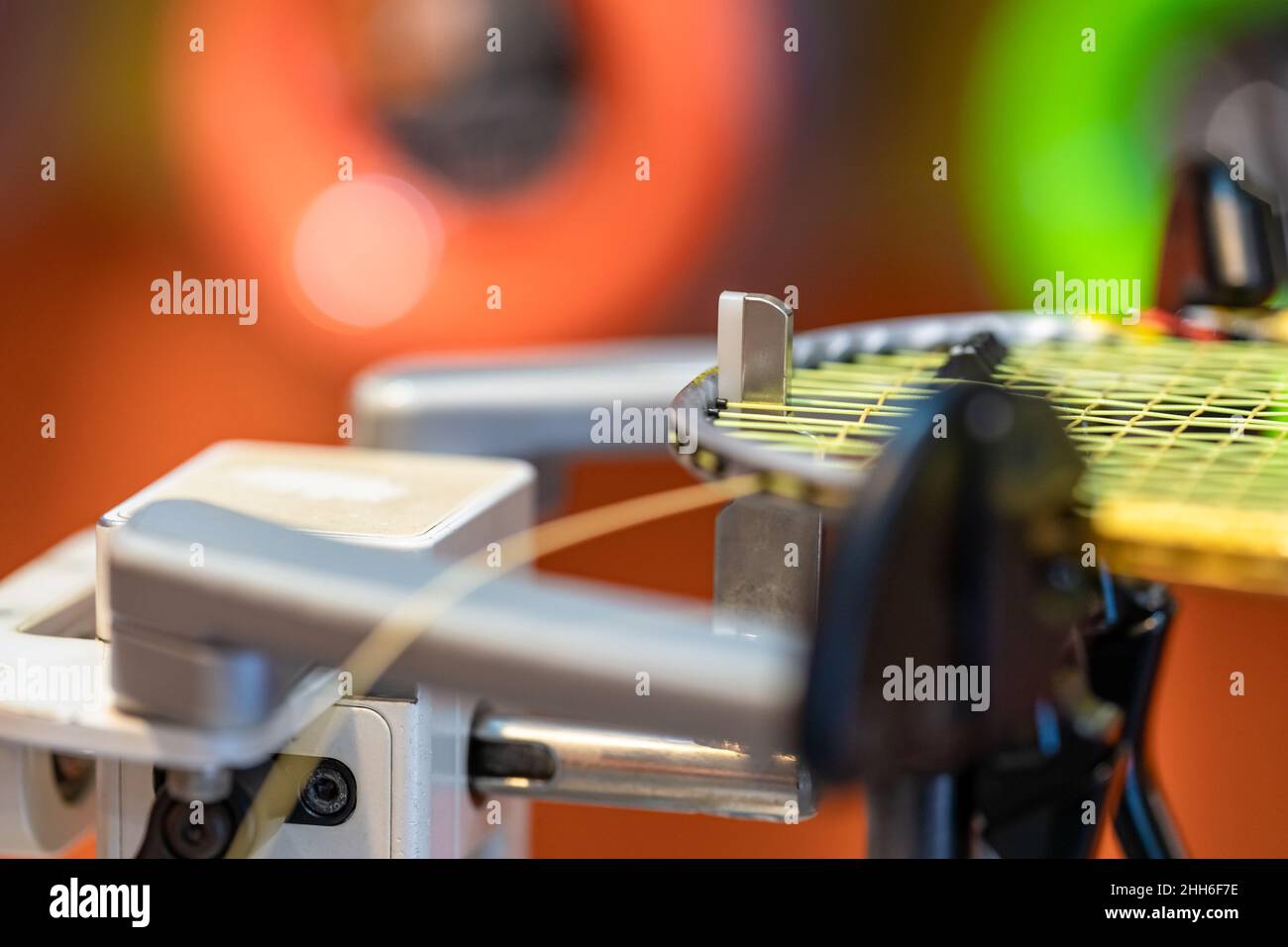 badminton racket repair and weaving Stock Photo - Alamy