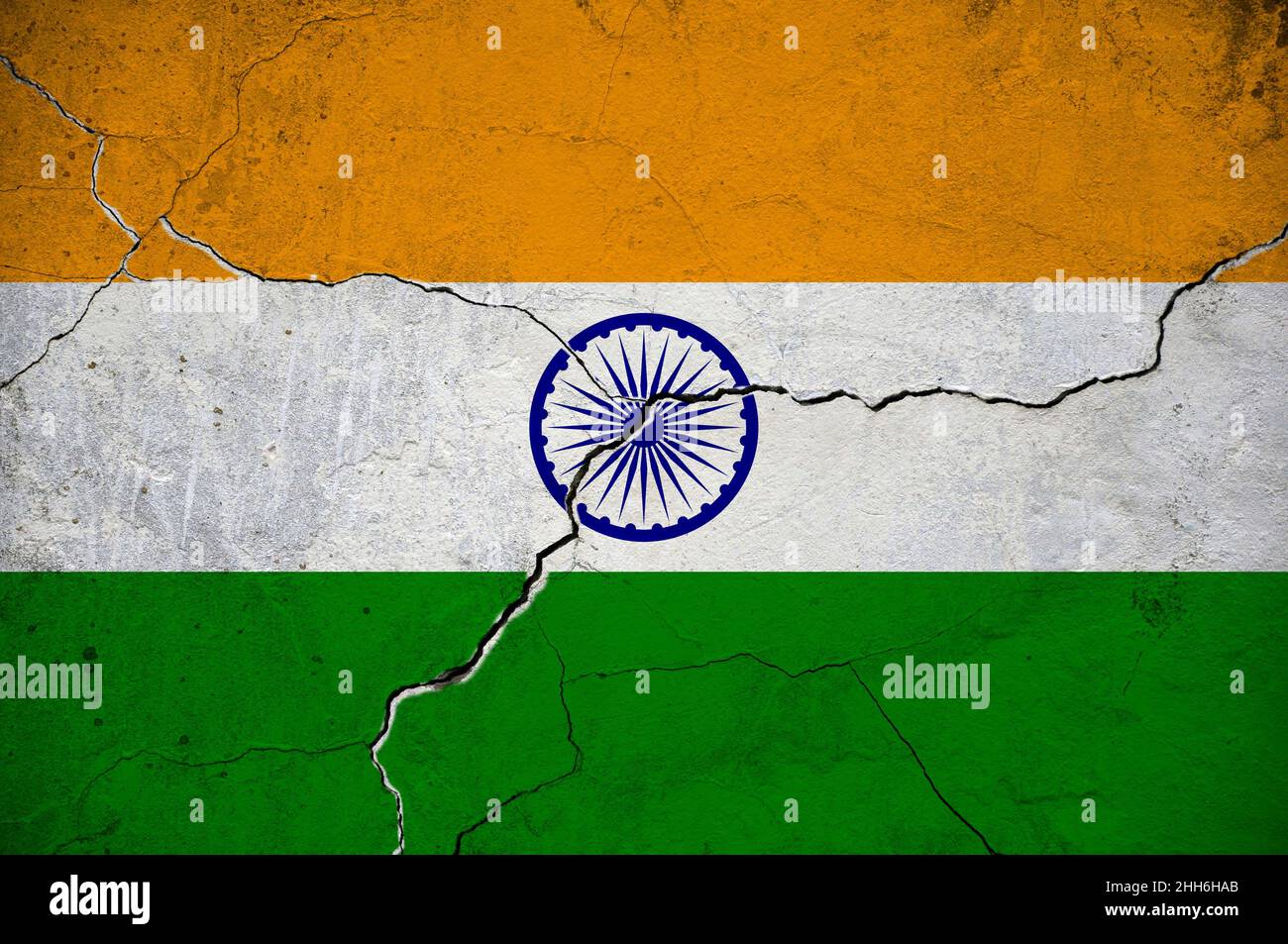An image of the India flag on a wall with a crack. Background. Stock Photo