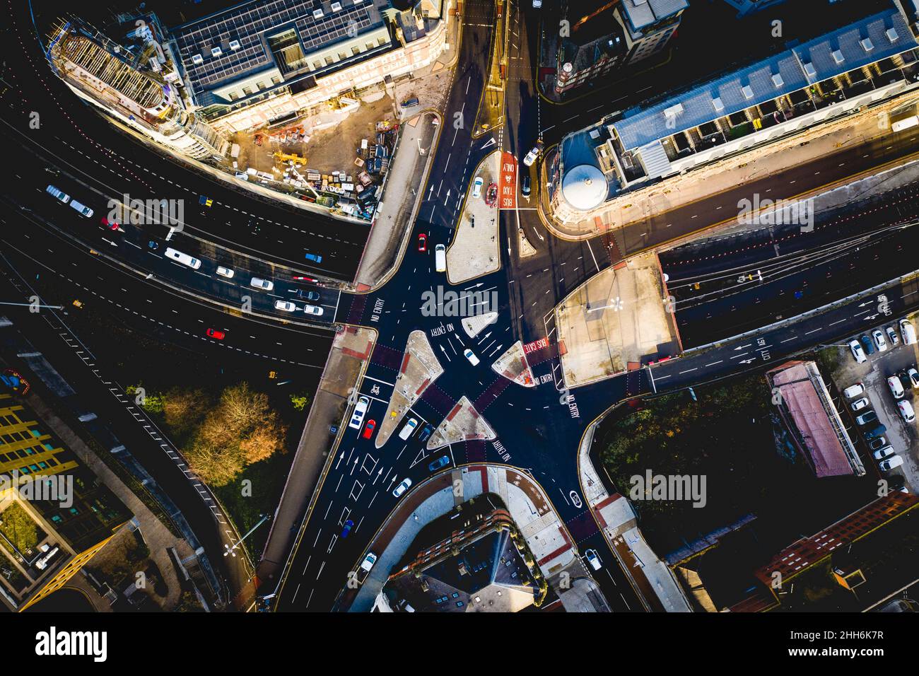 An aerial view directly above a complicated road junction and overpass with traffic moving in different directions in Leeds, West Yorkshire Stock Photo