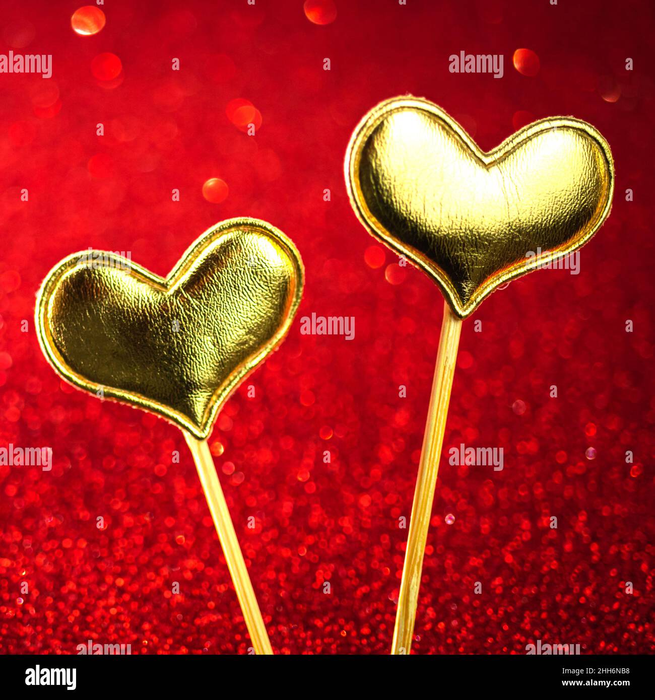 Valentines Day hearts. Red sparkling glitter background with defocused ...