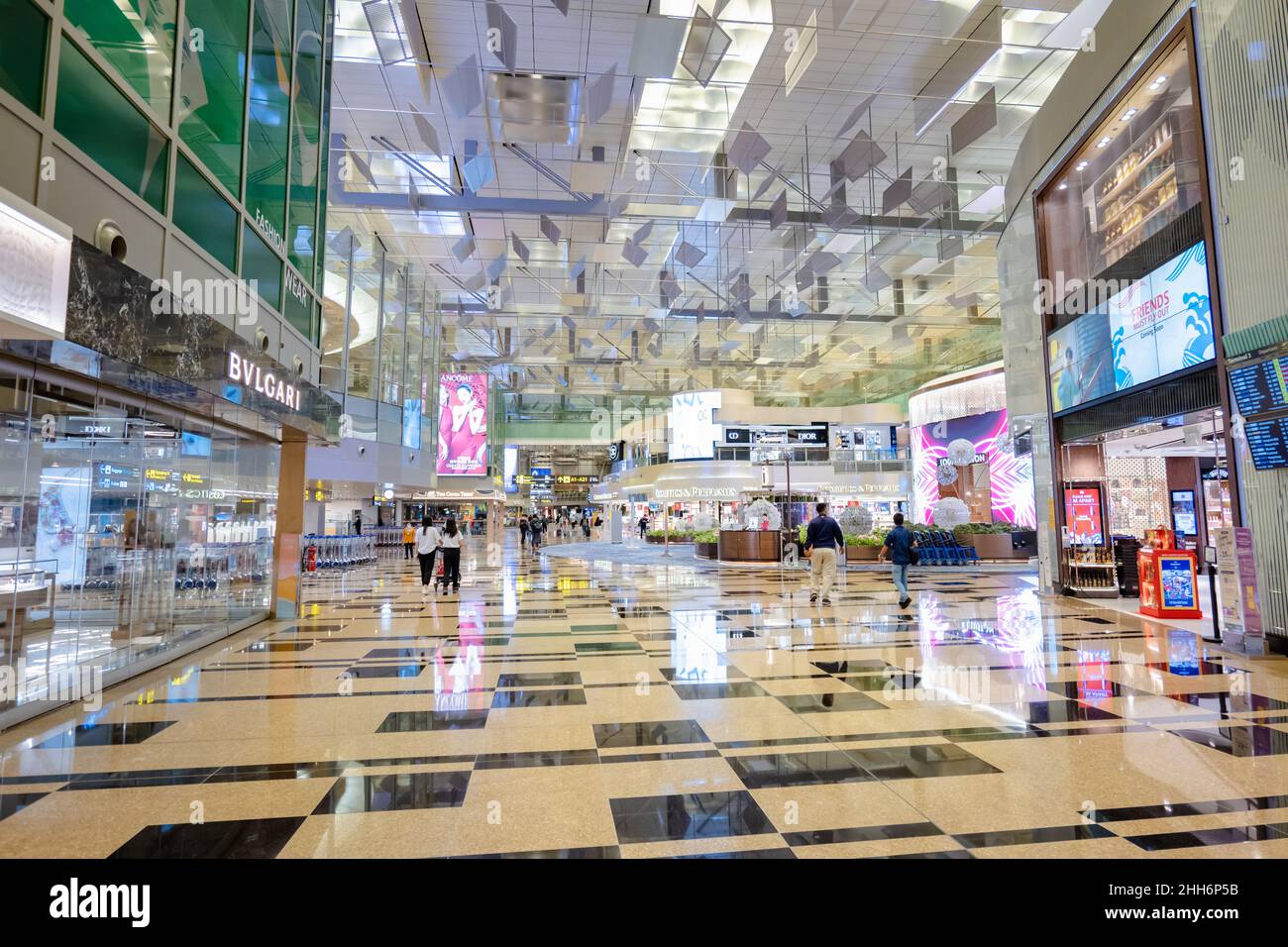 Singapore - January 2022: Singapore Changi Airport duty free shop area architecture. Singapore Changi Airport is one of the largest airports in Asia. Stock Photo