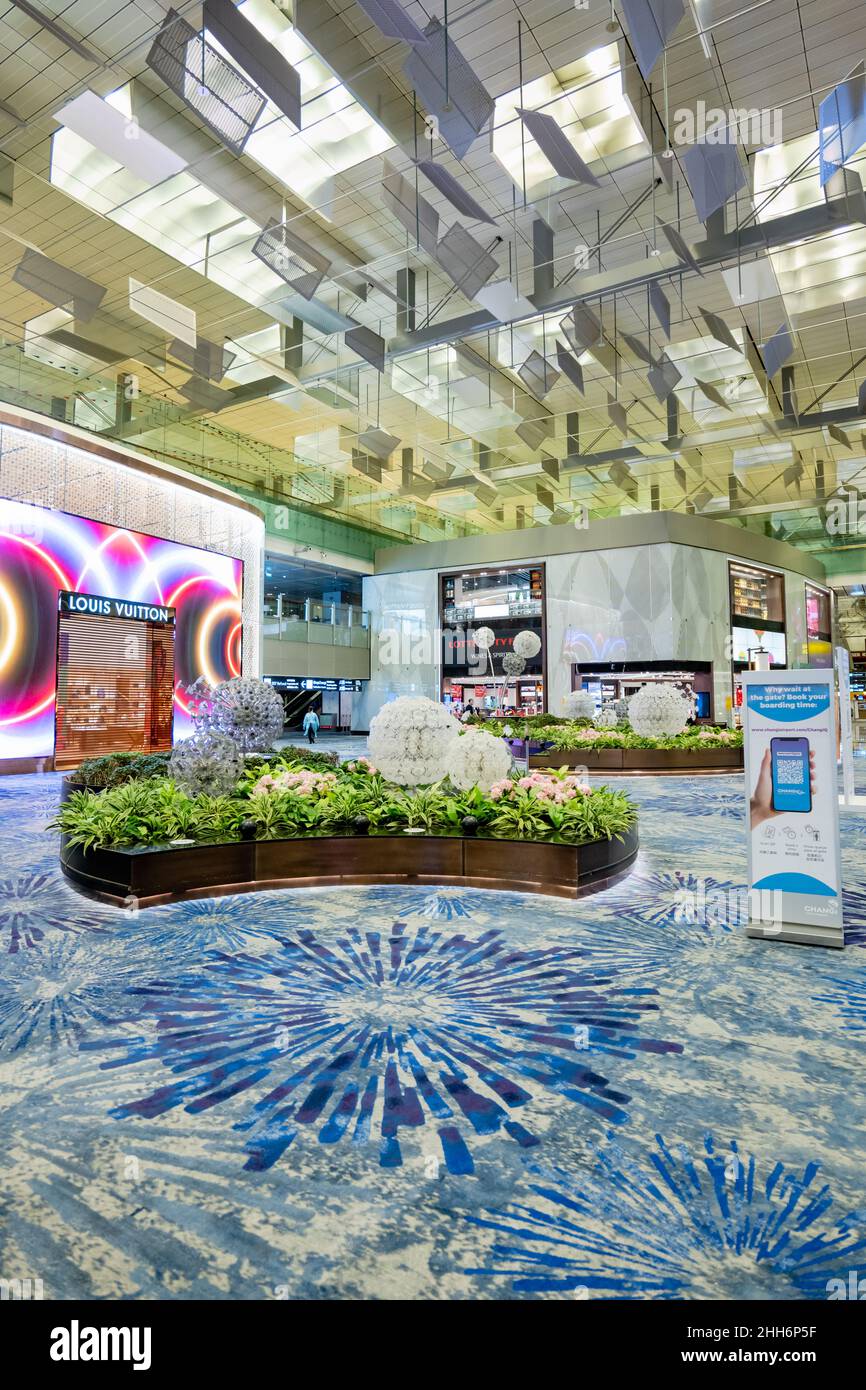 Singapore - January 2022: Singapore Changi Airport duty free shop area architecture. Singapore Changi Airport is one of the largest airports in Asia. Stock Photo