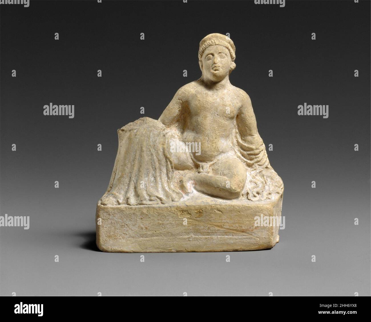 Terracotta statuette of a "temple boy" 3rd century B.C. Cypriot Votive