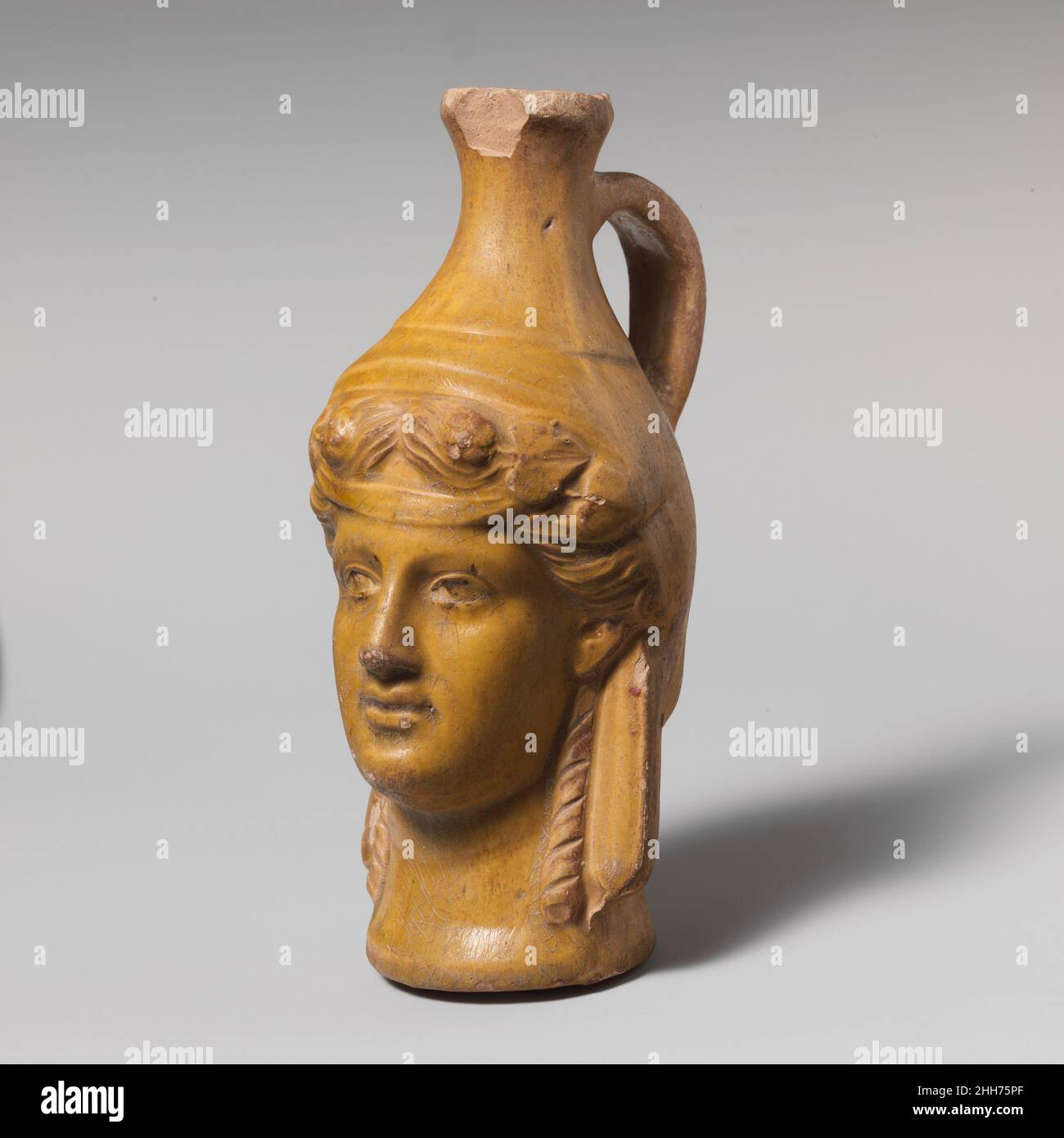 Flask God Terracotta jug in the form of Dionysos 1st century B.C. Greek or Roman ...