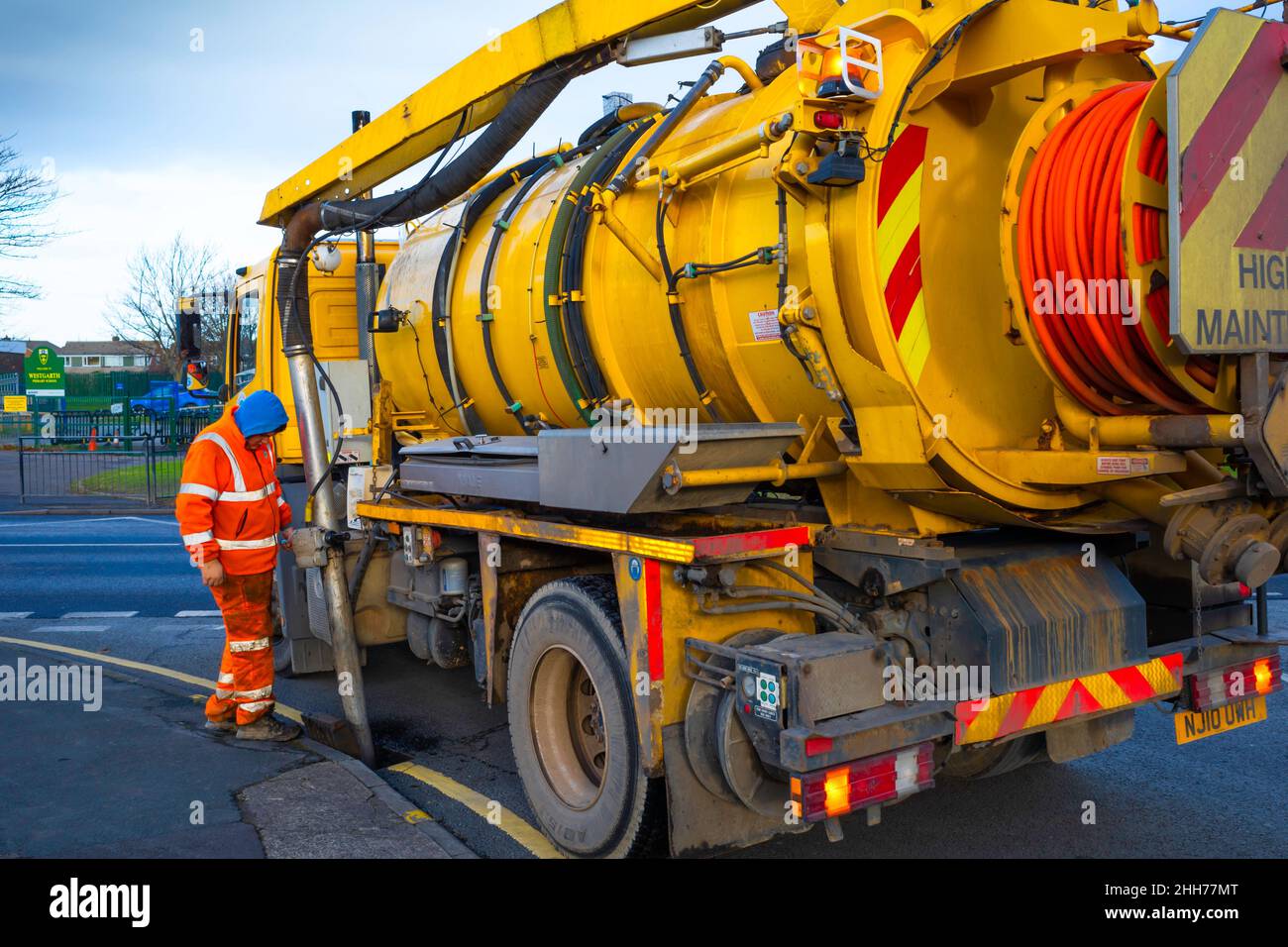 Interceptor Operator Local Authority operator using a vacuum tanker interceptor to remove ...