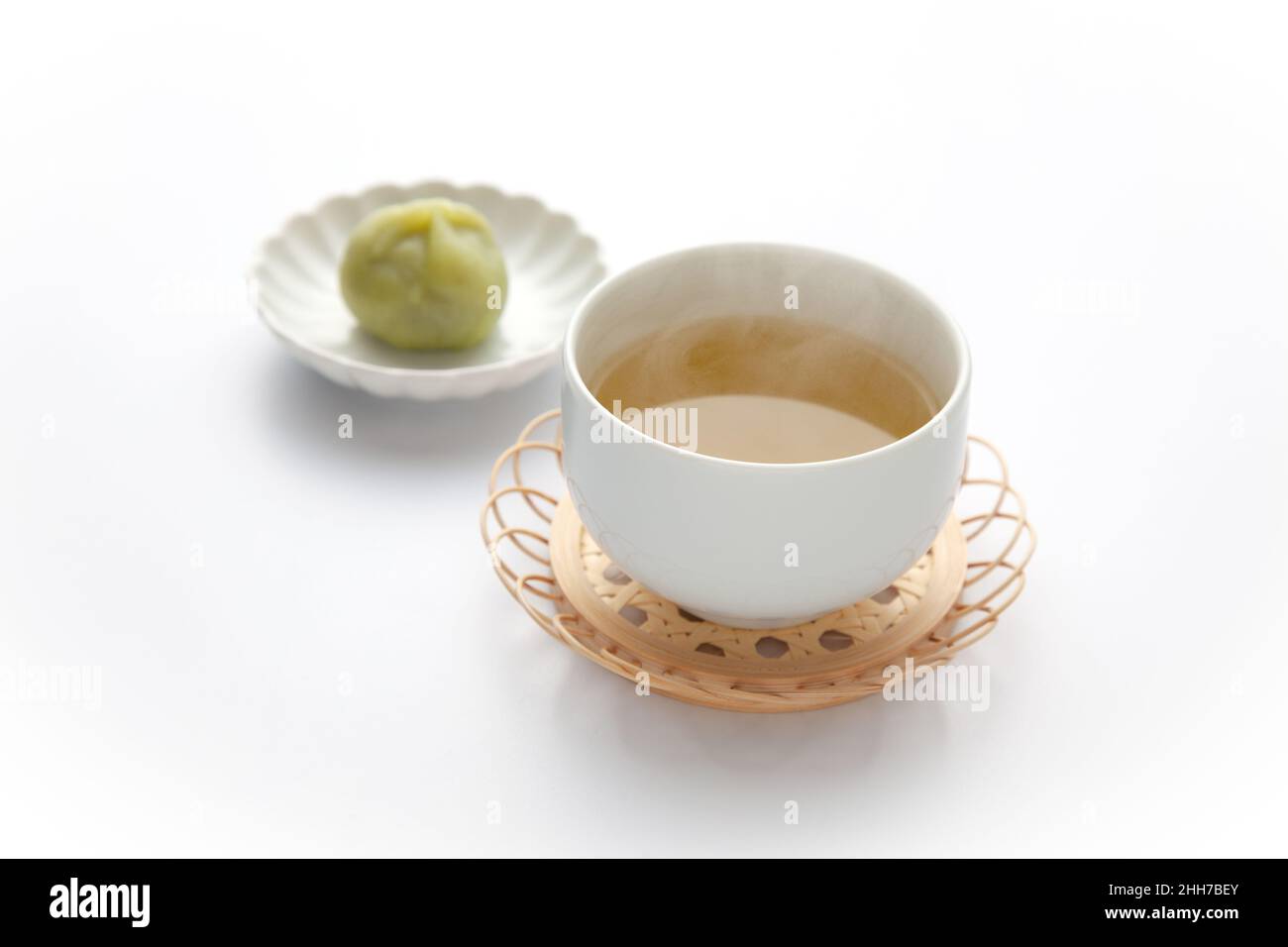 hot green tea Japanese tea with dessert isolated on white background