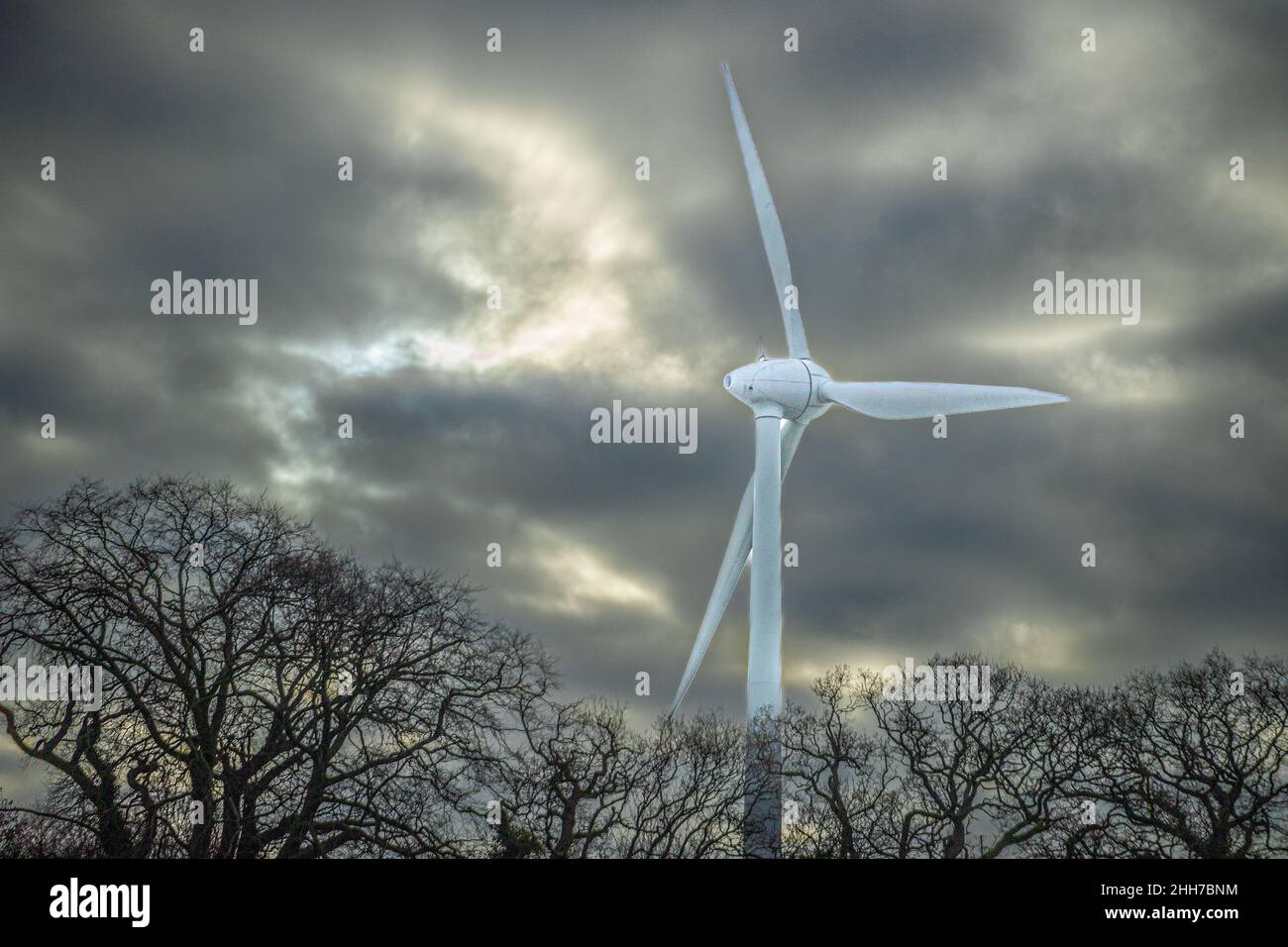 wind turbine in the gloomy sky Stock Photo
