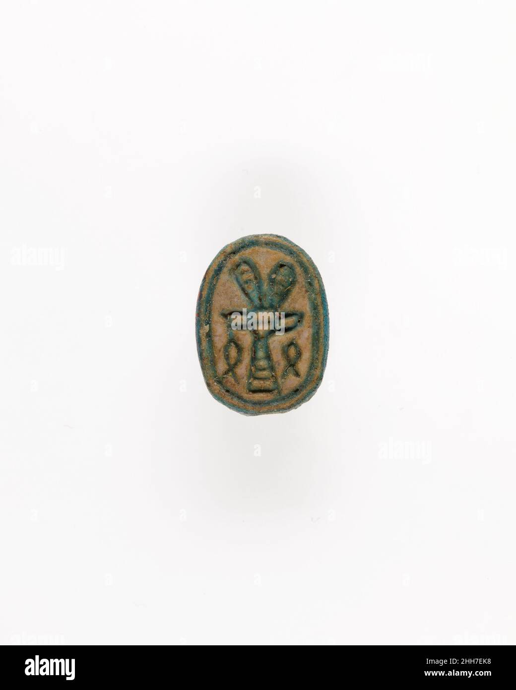 Scarab with Hathor-like Canaanite Goddess ca. 1740–1640 B.C. Middle Kingdom Around the middle of Dynasty 13 (ca. 1802–1640 B.C.), scarabs carved in the eastern Nile Delta, at a site presently known as Tell el-Dab’a, show decorative elements that reveal Canaanite influence. Part of the population in this region was of Levantine origin. Soon afterward, at the beginning of the Second Intermediate Period (ca. 1700/1640 B.C), when Canaanites took political control over the Delta, a Canaanite production of scarabs is initiated; these scarabs also show details on their back and sides that distinguish Stock Photo