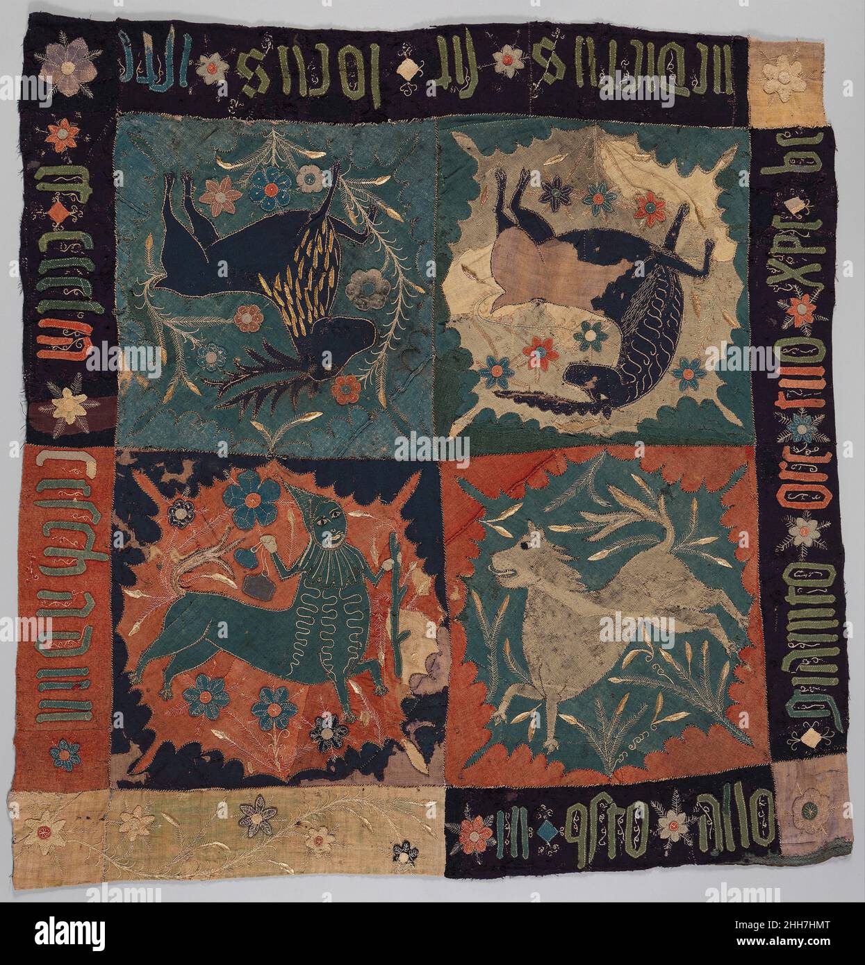 Textile Fragment with Unicorn, Deer, Centaur and Lion ca. 1500 Scandinavian Like the cloth from Perugia seen here, this textile features a combination of real and imaginary creatures. The inscription, only partially legible and apparently mixing Latin and Italian, invokes the name of Christ and the Church, indicating the cloth’s original use in a religious context.. Textile Fragment with Unicorn, Deer, Centaur and Lion  479598 Stock Photo