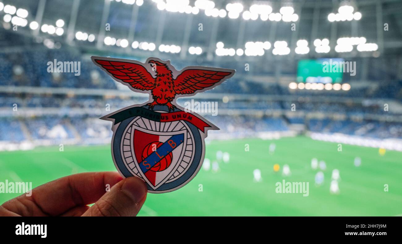 September 12, 2021, Lisbon, Portugal. football club emblem S.L.  Benfica against the backdrop of a modern stadium. Stock Photo