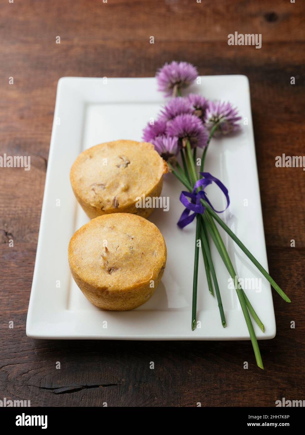 Home made Vegan Chive Blossom Cornbread Muffins Stock Photo