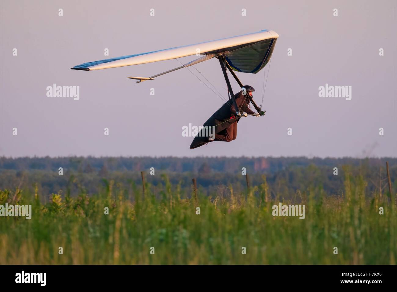 Sport hang glider low above ground. Extreme sports Stock Photo