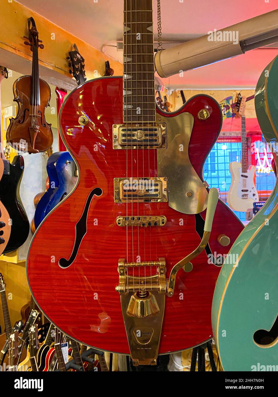 Guitar in music shop Stock Photo